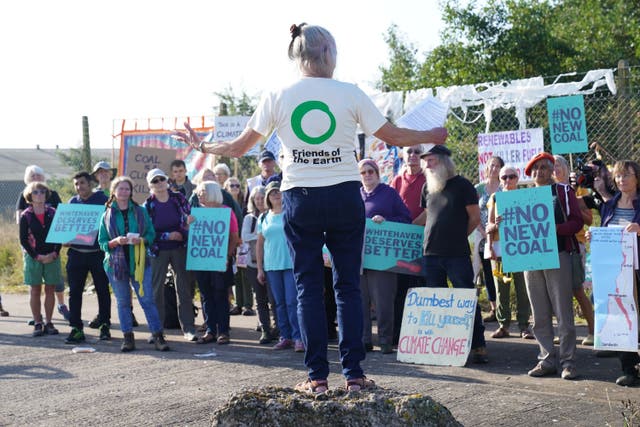 Demonstrators outside the proposed site of the Whitehaven coal mine in Cumbria in 2021 (Owen Humphreys/PA)