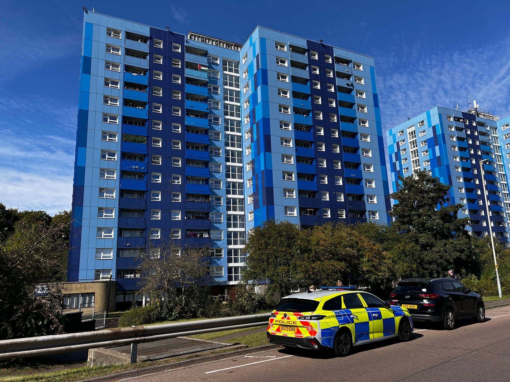 Three people were found dead at a flat in Luton on Friday