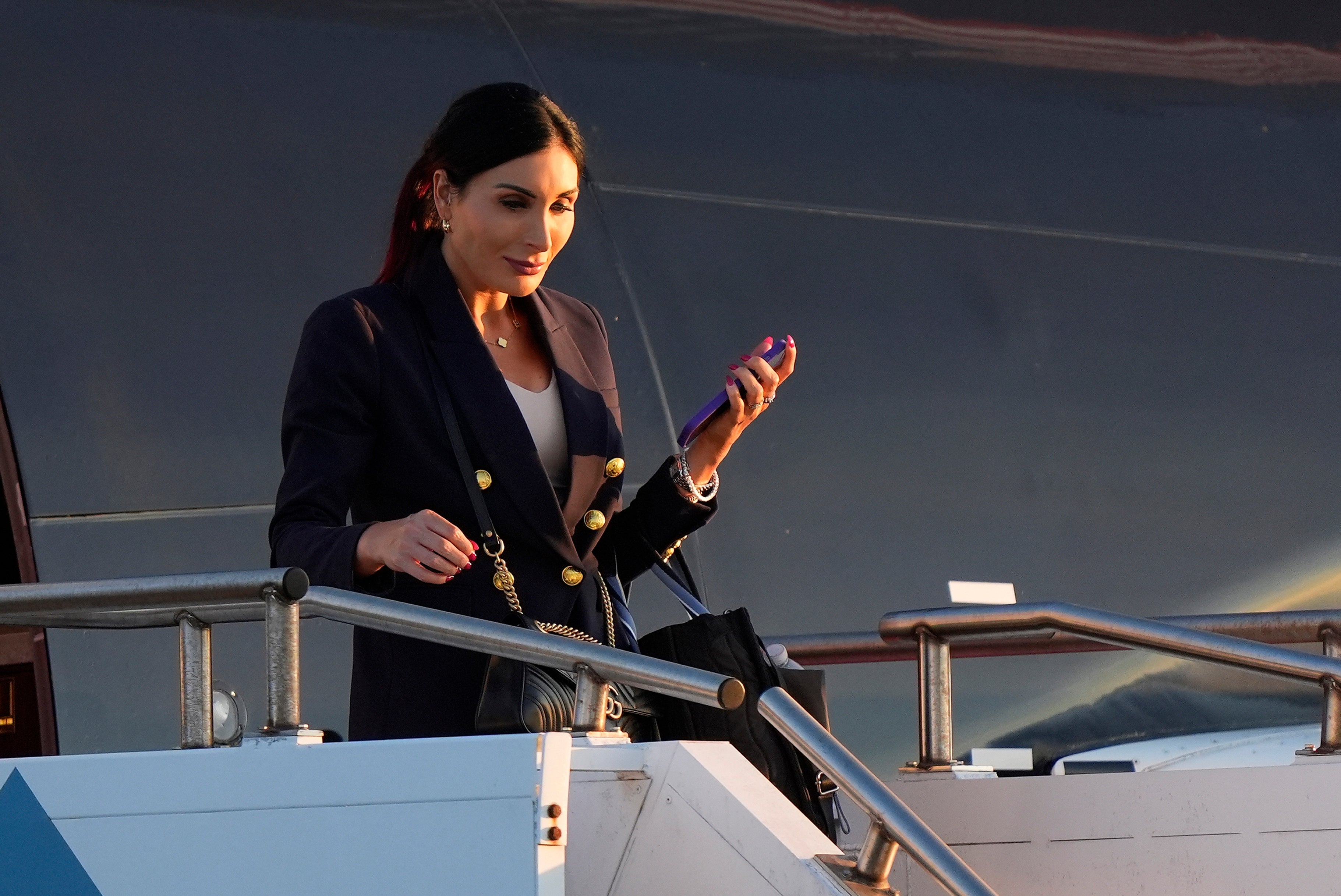 Laura Loomer stepping off Trump’s plane in Philadelphia last week