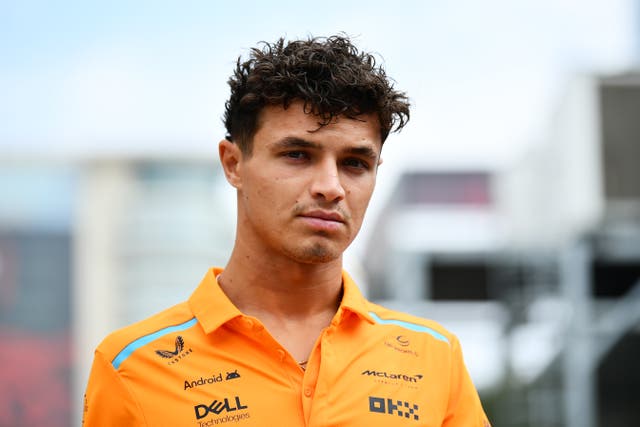 <p>Lando Norris looks on in the Paddock prior to practice ahead of the Azerbaijan Grand Prix at Baku City Circuit</p>