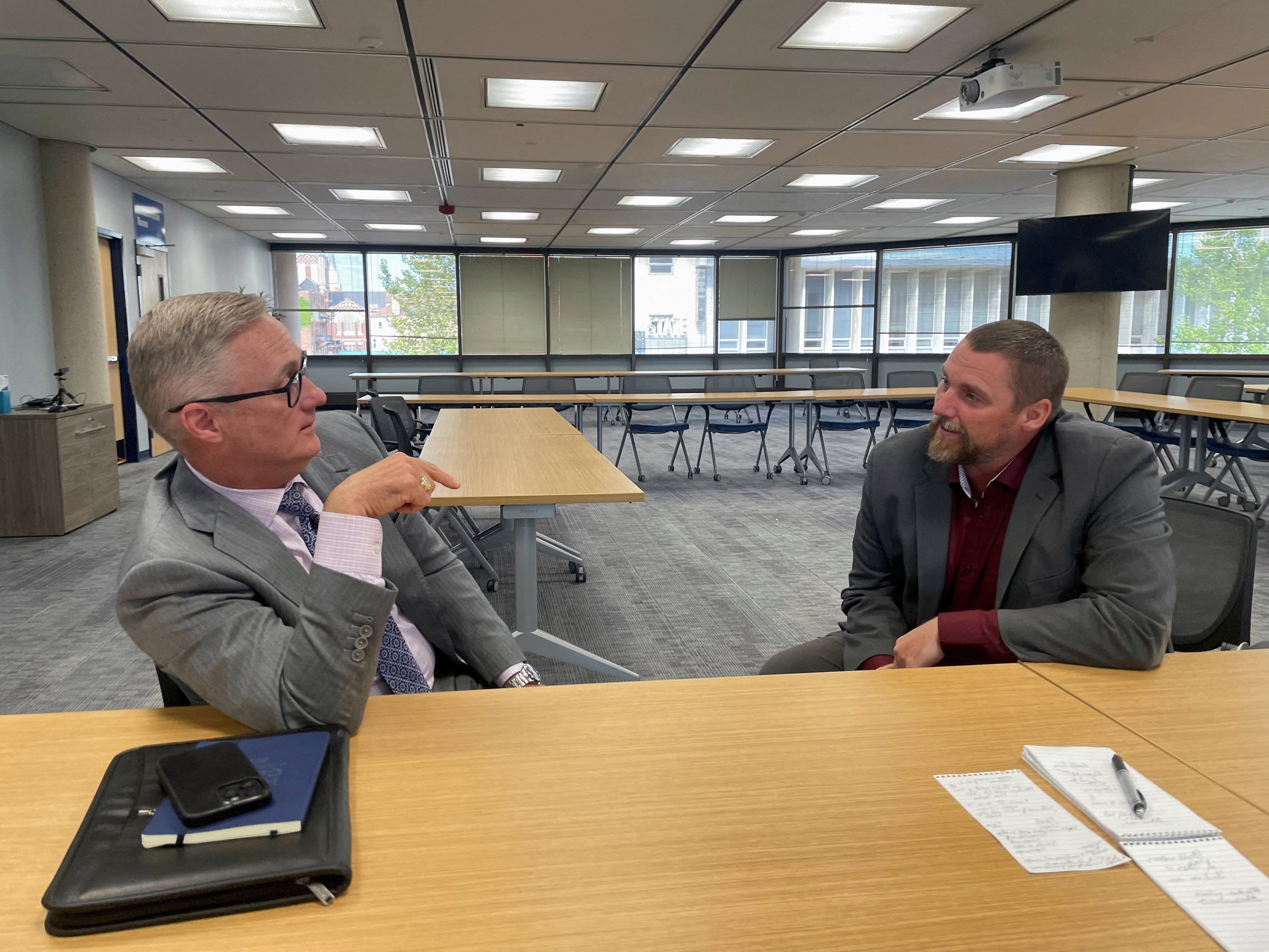 Springfield city manager Bryan Heck (left), seen here with mayor Rob Rue, promised this week to oversee construction of 2,000 new residential housing units