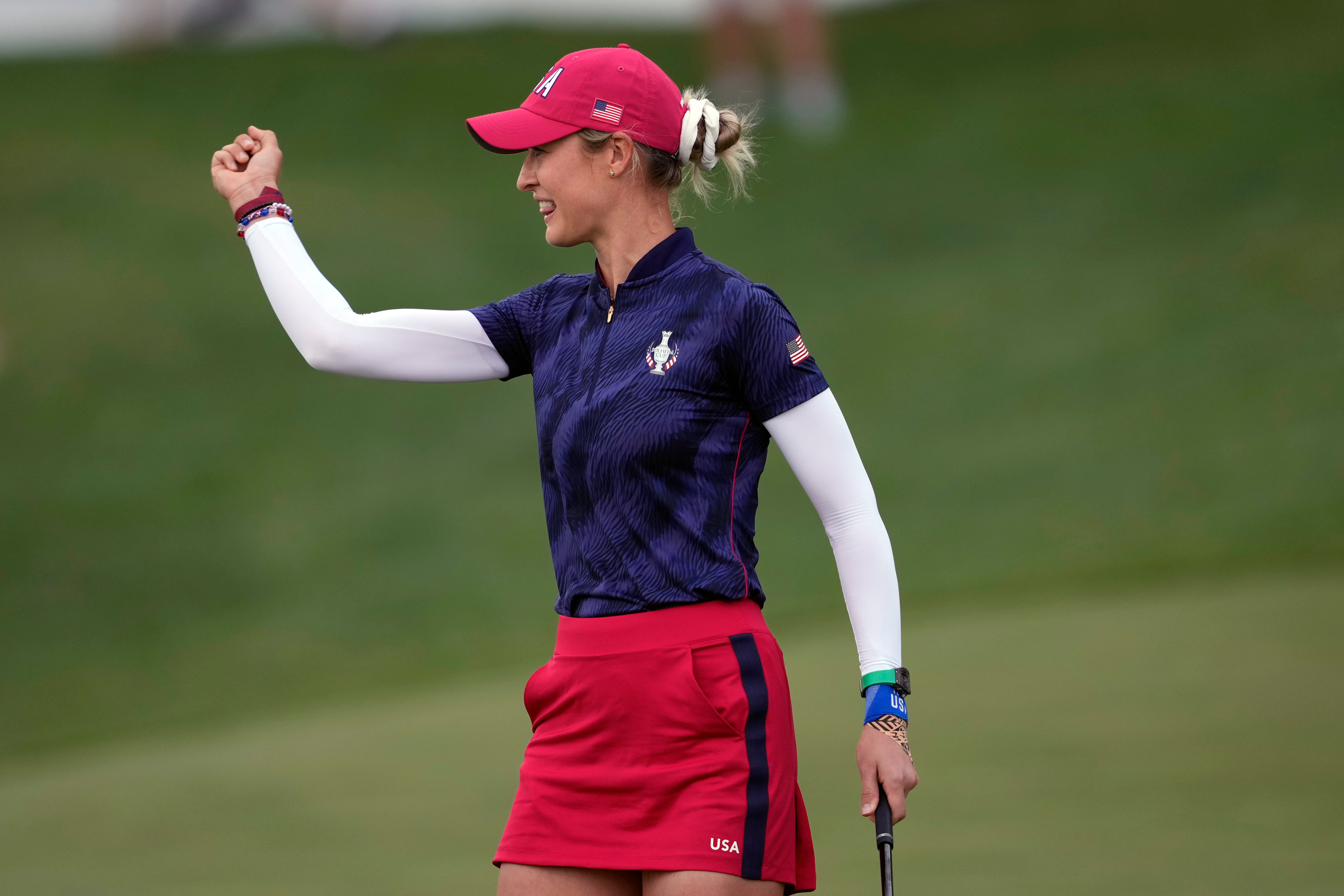 Nelly Korda celebrates a United States victory against Europe on the 14th hole at the Solheim Cup in Virginia (Matt York/AP)