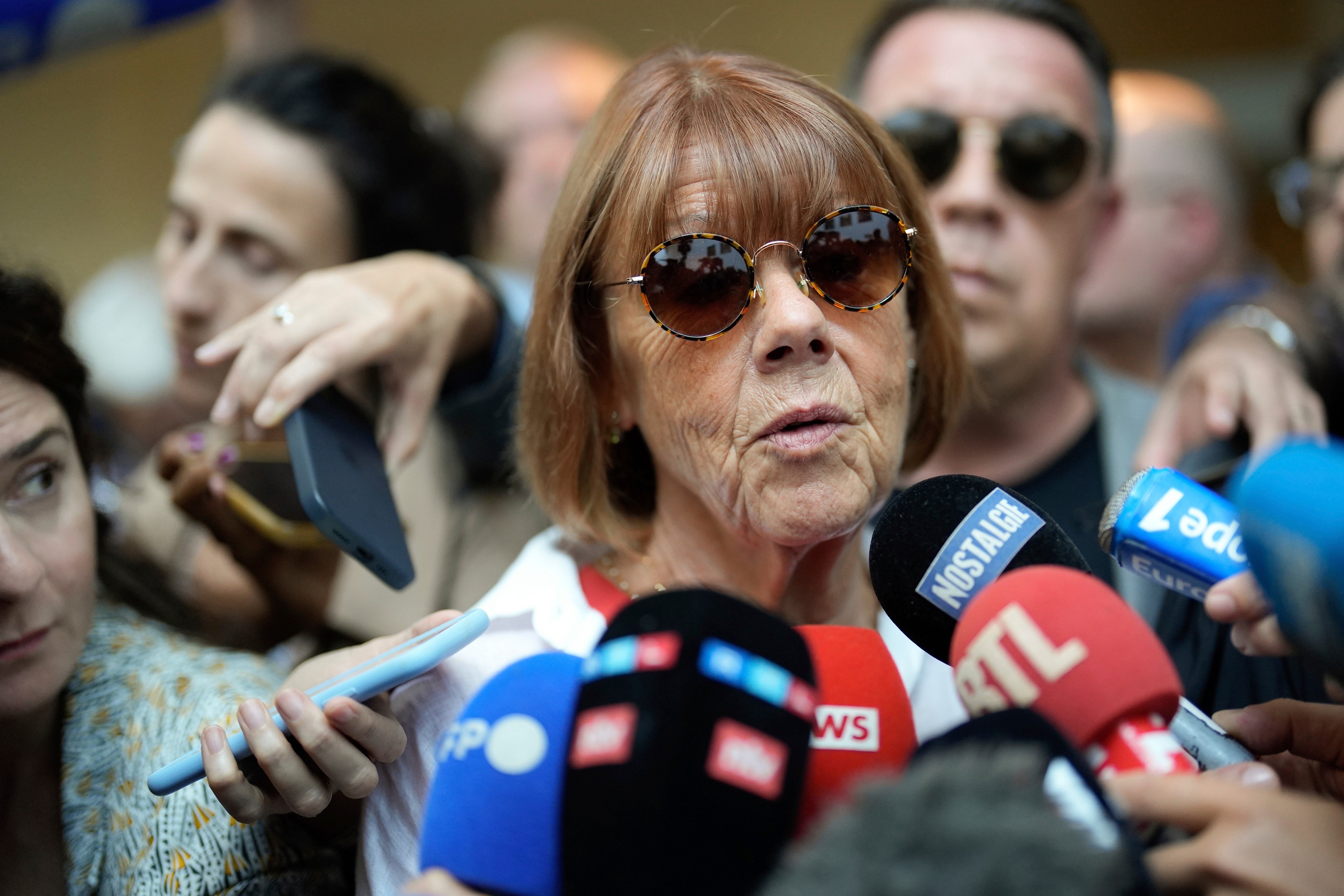 Gisele Pelicot speaks to media as she leaves the Avignon court house, southern France,