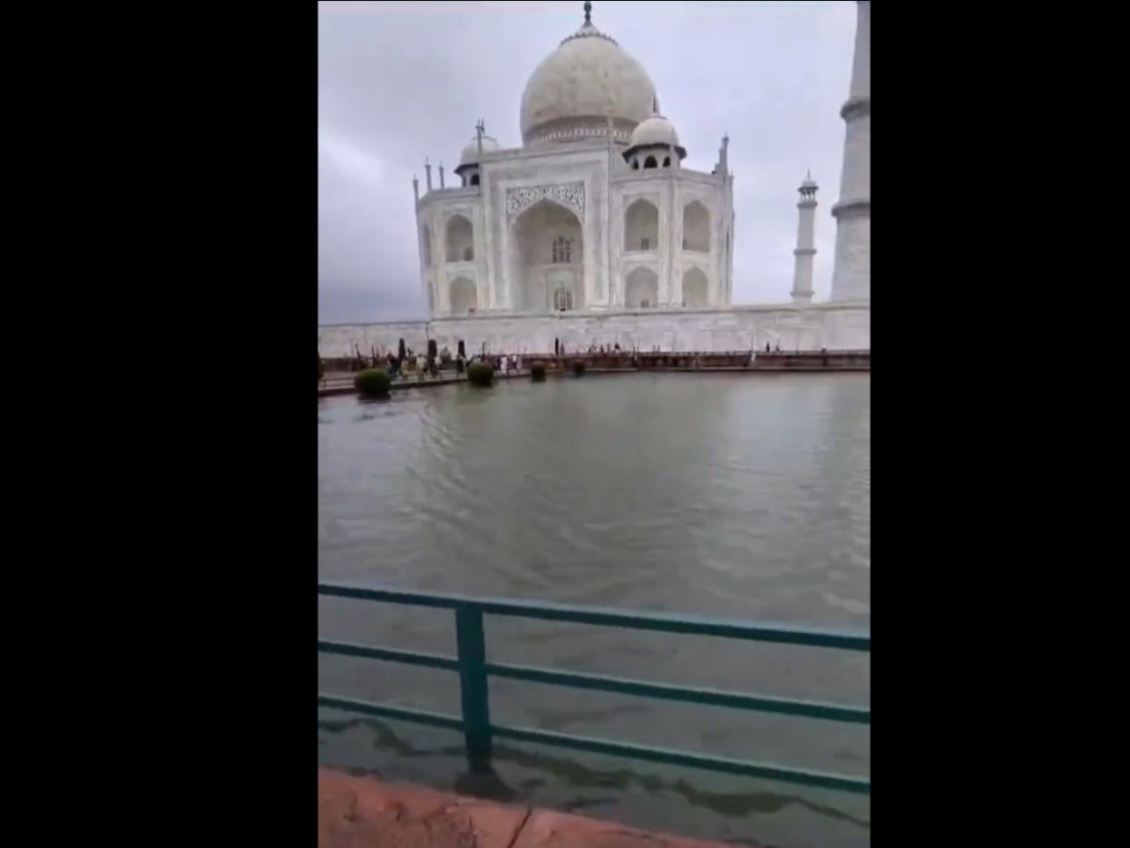 A still from a video of the Taj Mahal shows water flooding the monument's garden