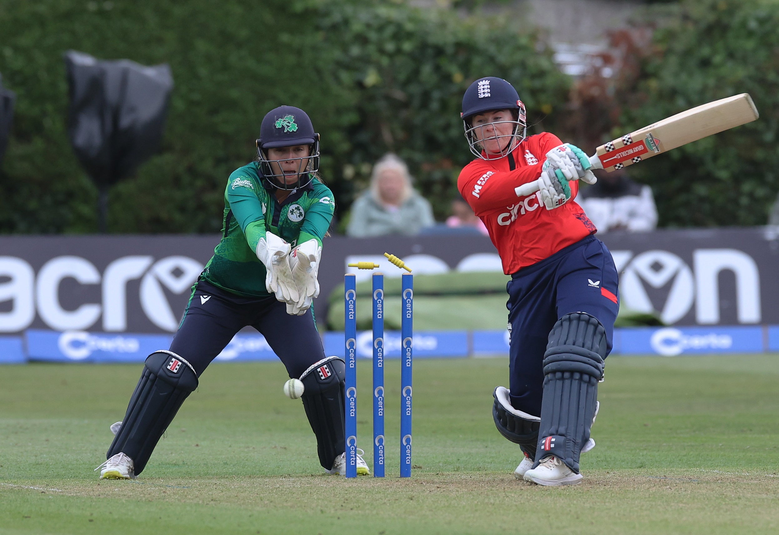 England batter Tammy Beaumont is bowled by Jane Maguire during the T20 international against Ireland in Dublin