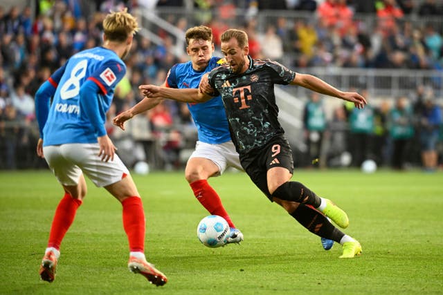 England skipper Harry Kane plundered a hat-trick as Bayern Munich won 6-1 at Holstein Kiel (Gregor Fischer/AP)