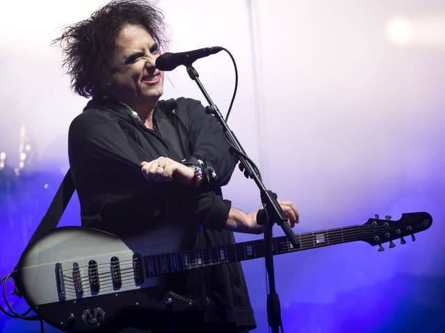 <p>The Cure’s Robert Smith performs on the Pyramid Stage at Glastonbury 2019</p>