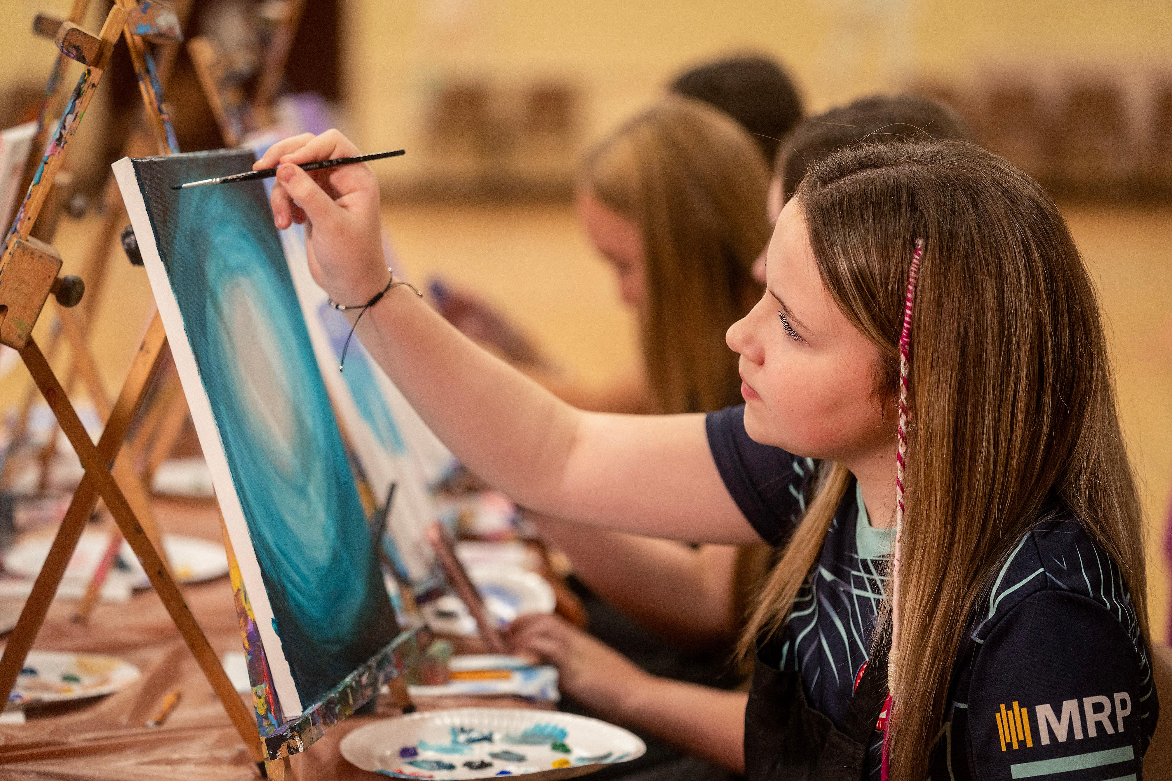 Gracie Cullen taking part in an arts workshop with Beam Creative Network in Coalisland (Arts Council of NI/PA)