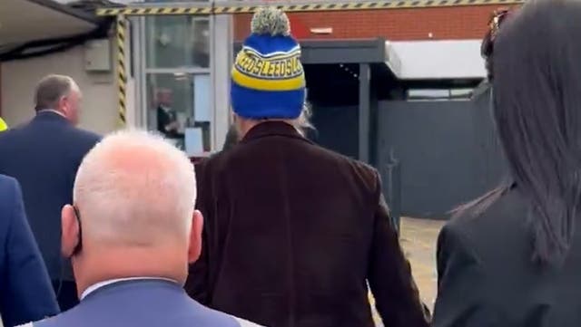 <p>Hollywood actor dons Leeds United bobble hat as he arrives at Elland Road.</p>