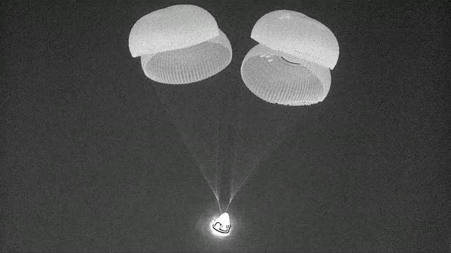 <p>The space capsule landing in the Gulf of Mexico</p>