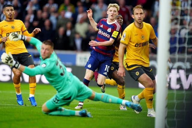 <p>Anthony Gordon looks on as his shot hits the post</p>