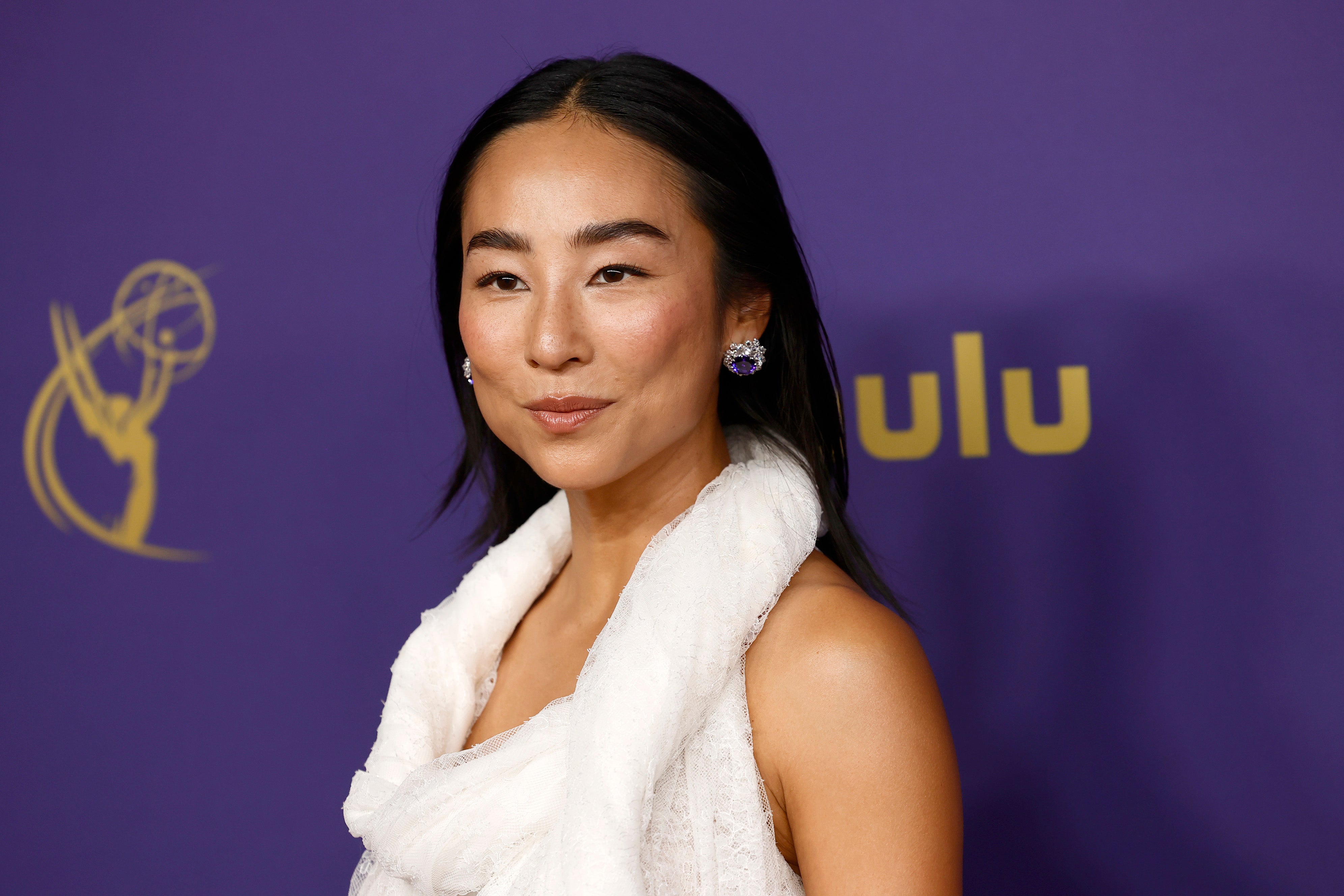 Greta Lee attends the 76th Primetime Emmy Awards