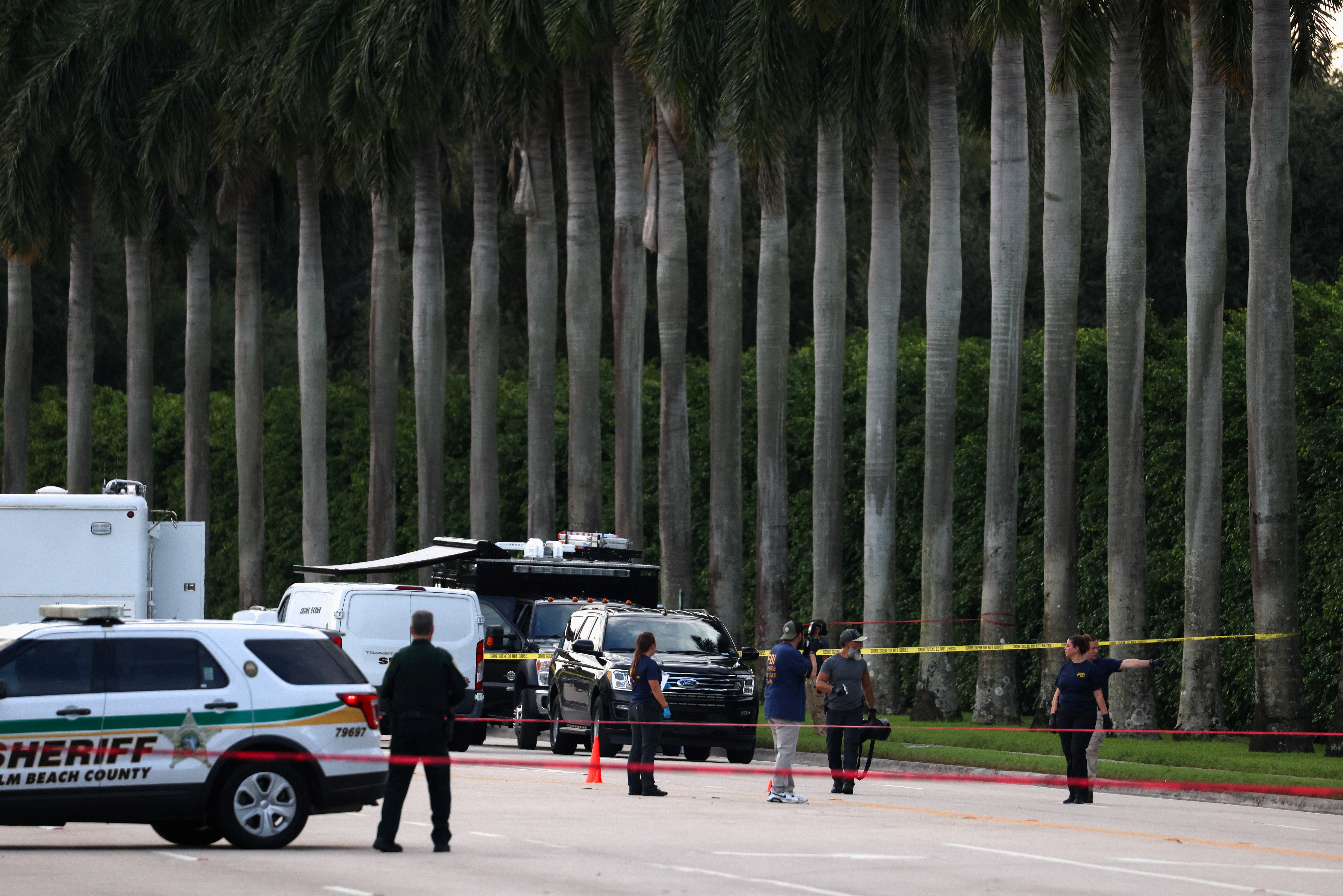 Law enforcement officers work after reports of shots fired outside Republican presidential nominee and former U.S. President Donald Trump's Trump International Golf Course in West Palm Beach, Florida, U.S. September 15, 2024