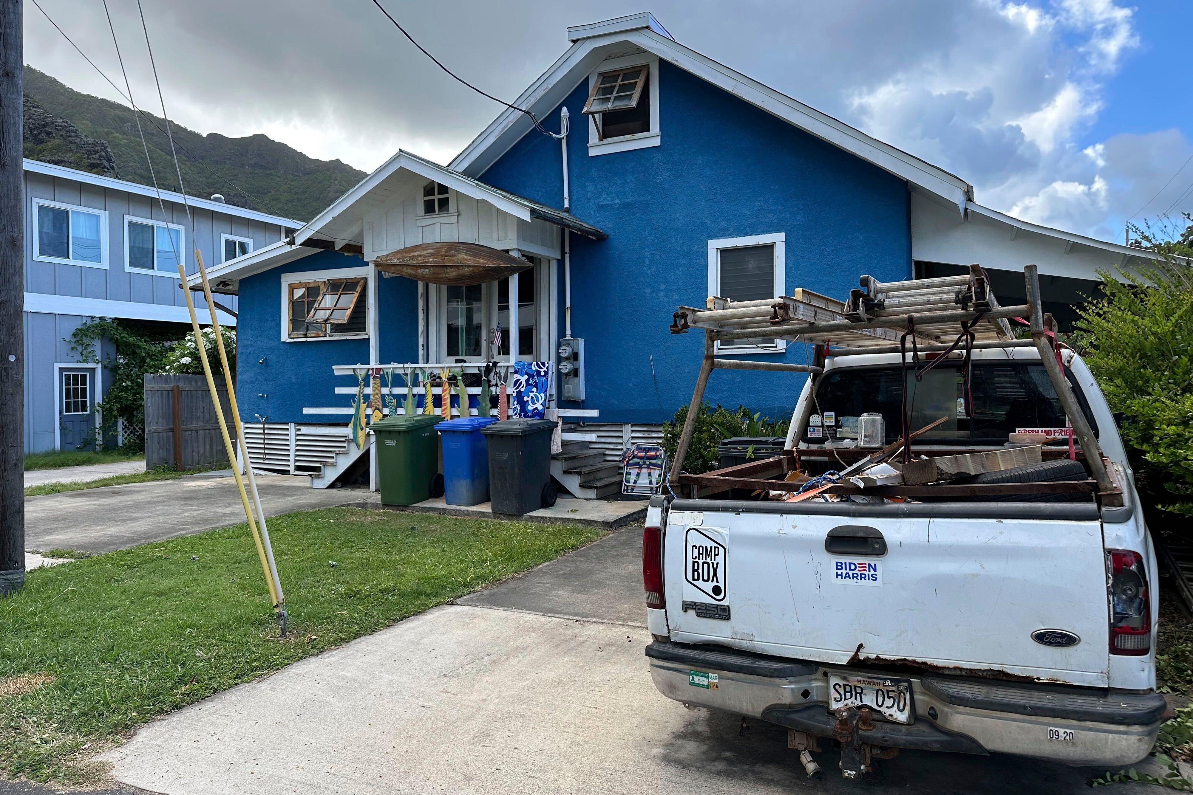 A truck with a ‘Biden-Harris’ bumper sticker parked outside the suspect’s home in Hawaii