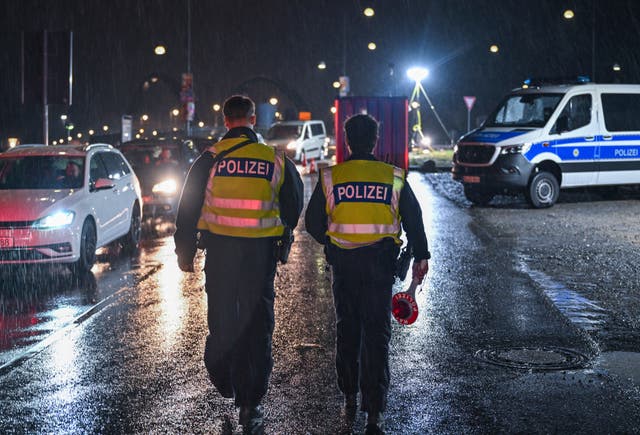 <p>Two German Federal Police officers patrol at the border crossing to Poland in Frankfurt/Oder, Germany, Monday, Sept. 16, 2024</p>