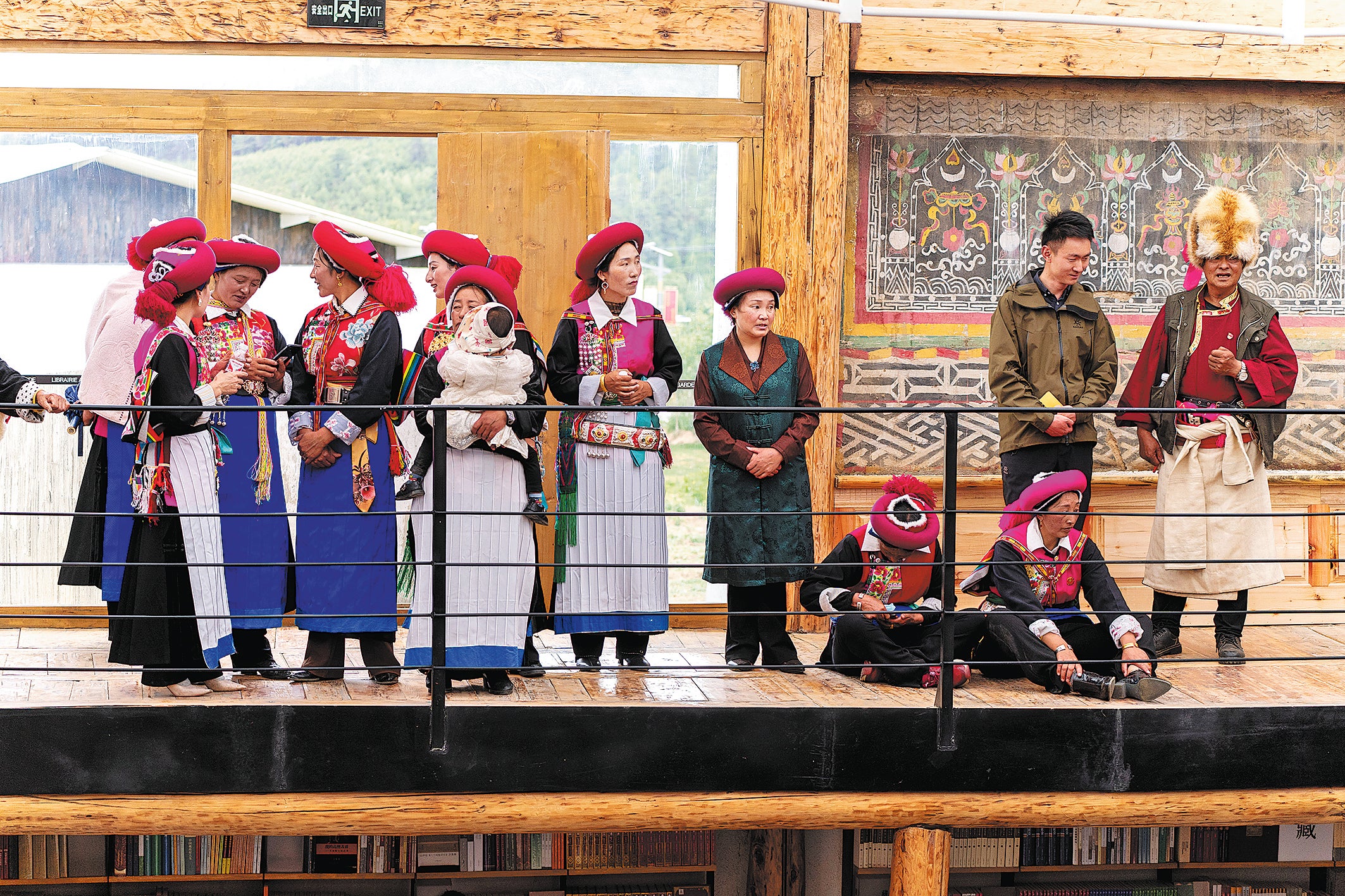 Residents from the nearby villages attend the opening ceremony of the bookstore