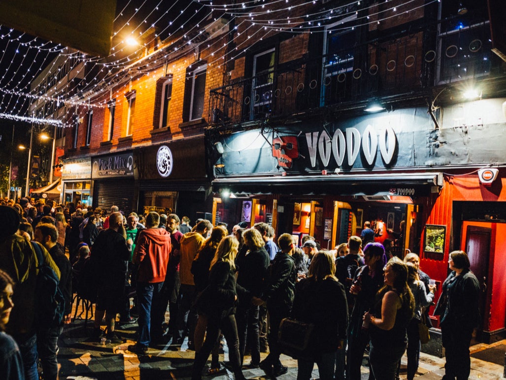 Music fans gather outside the Voodoo music venue in Belfast