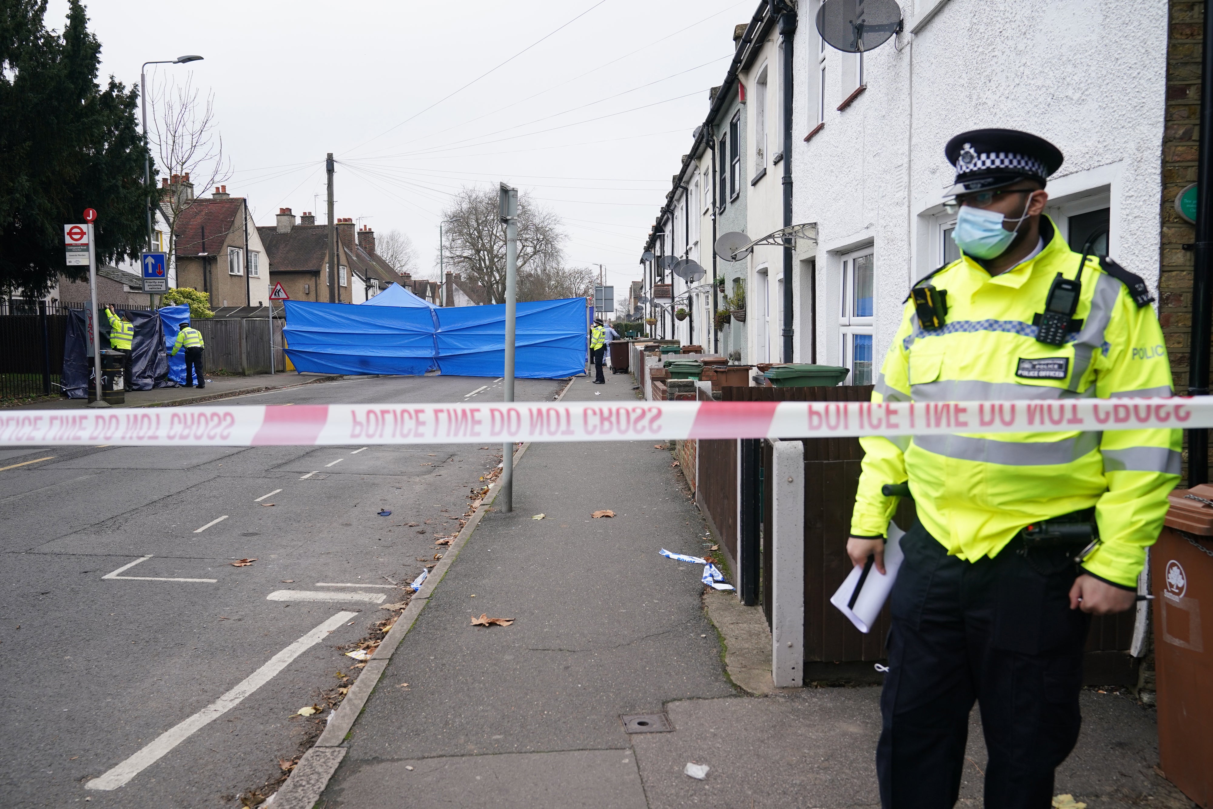 Police at the scene of the fire in Collingwood Road, Sutton (Yui Mok/PA)