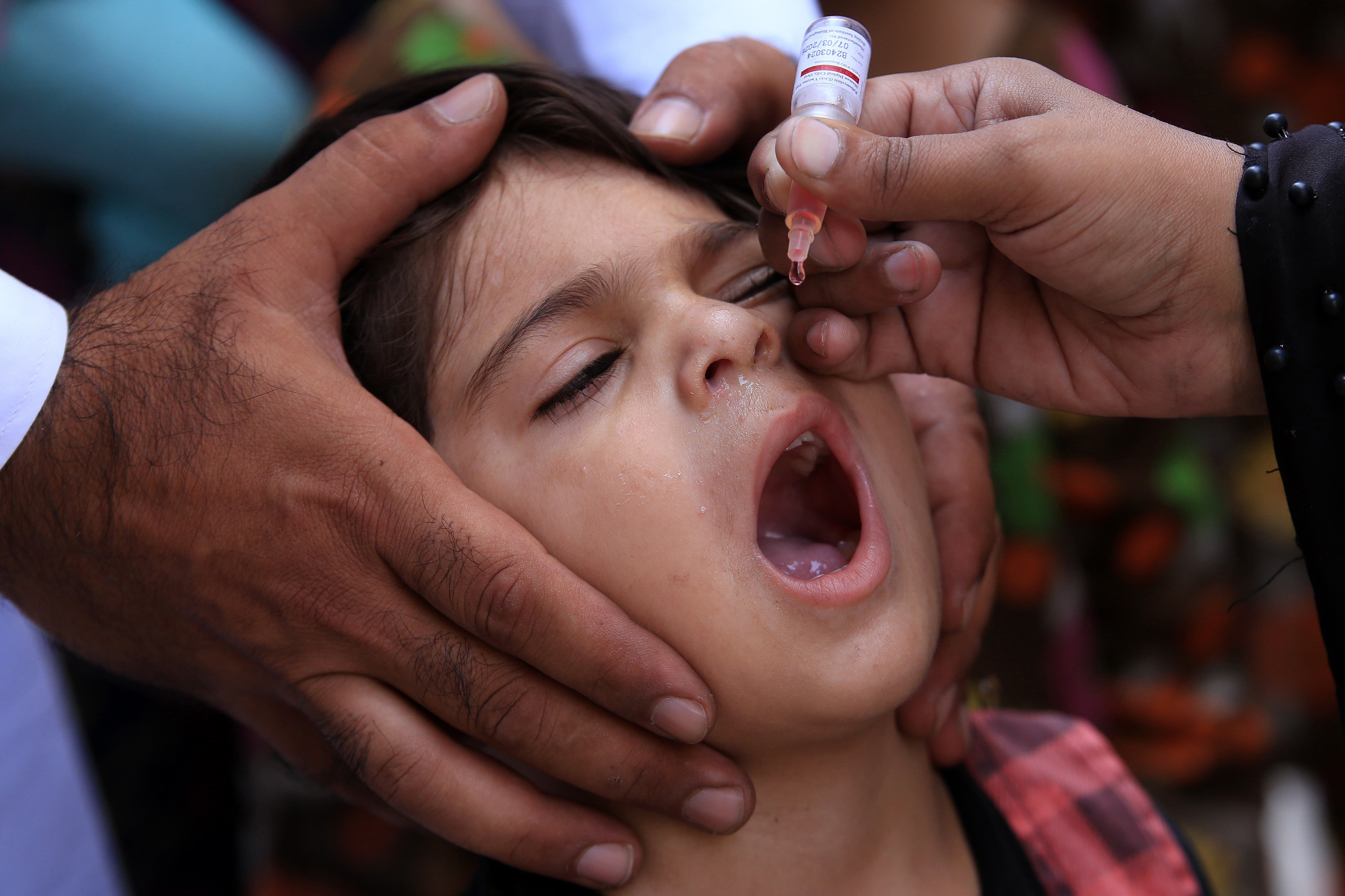 Security at polio vaccination campaign in Peshawar following attacks by suspected militants