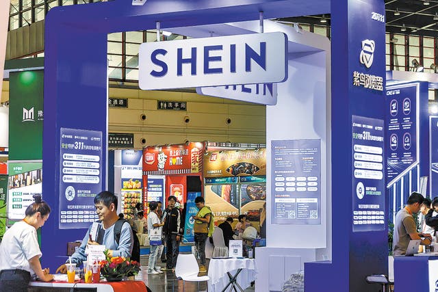 <p>Visitors gather at online retailer Shein’s booth during an expo in Zhengzhou, Henan province</p>