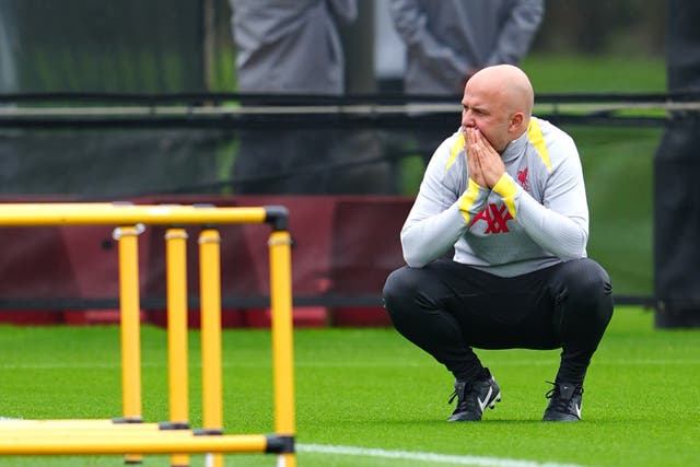 <p>Liverpool manager Arne Slot watches on during a training session</p>