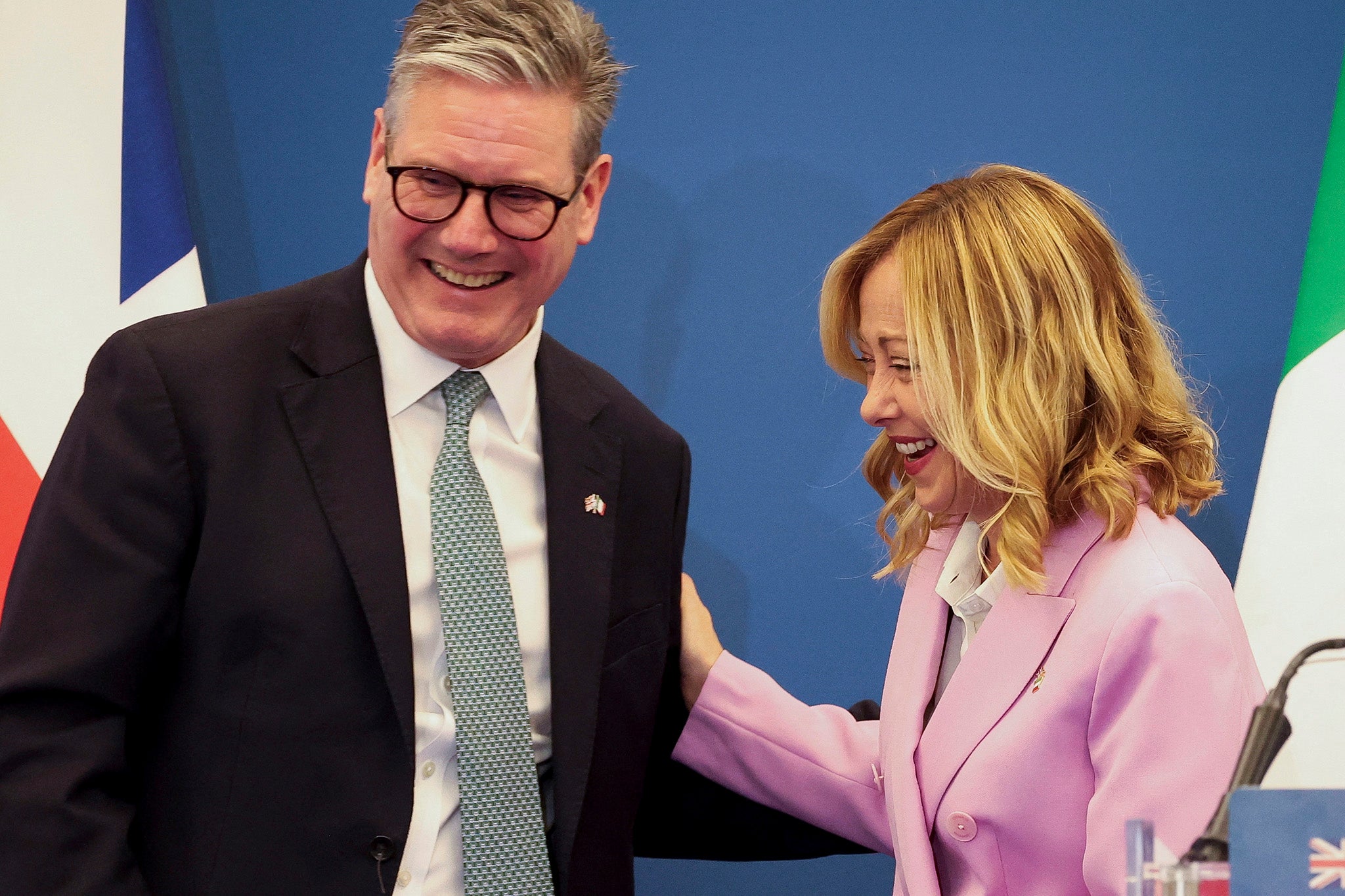 Italian Prime Minister Giorgia Meloni, right, and British Prime Minister Keir Starmer pose after a joint news conference