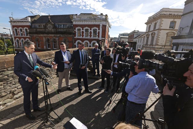 Simon Harris speaking to the media during his first official visit to Londonderry as Taoiseach (Liam McBurney/PA)