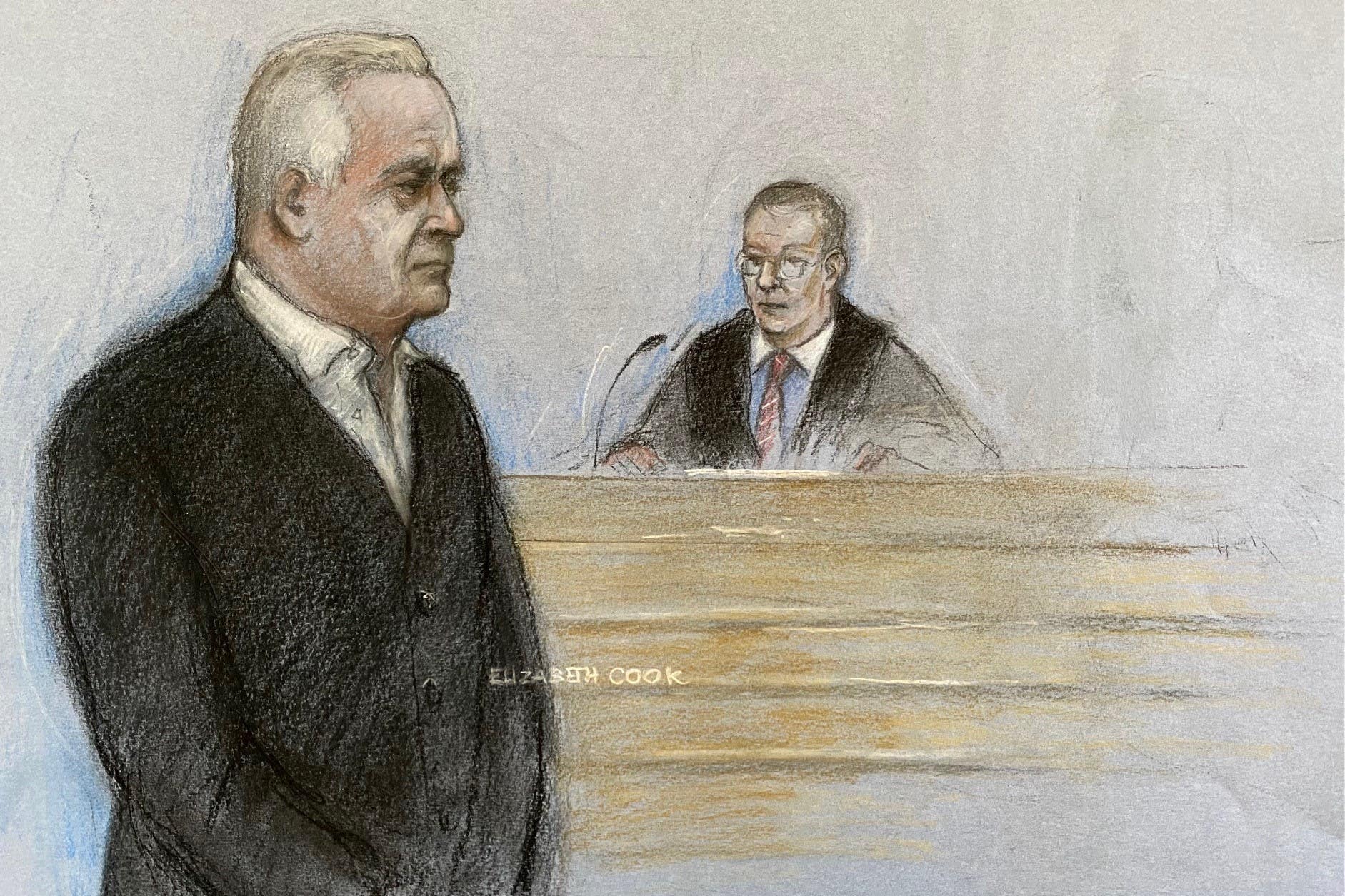 Court drawing of former BBC broadcaster Huw Edwards standing in the dock at Westminster Magistrates’ Court