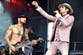 Jane’s Addiction suing lead singer Perry Farrell for $10m after brawl halted tour and album