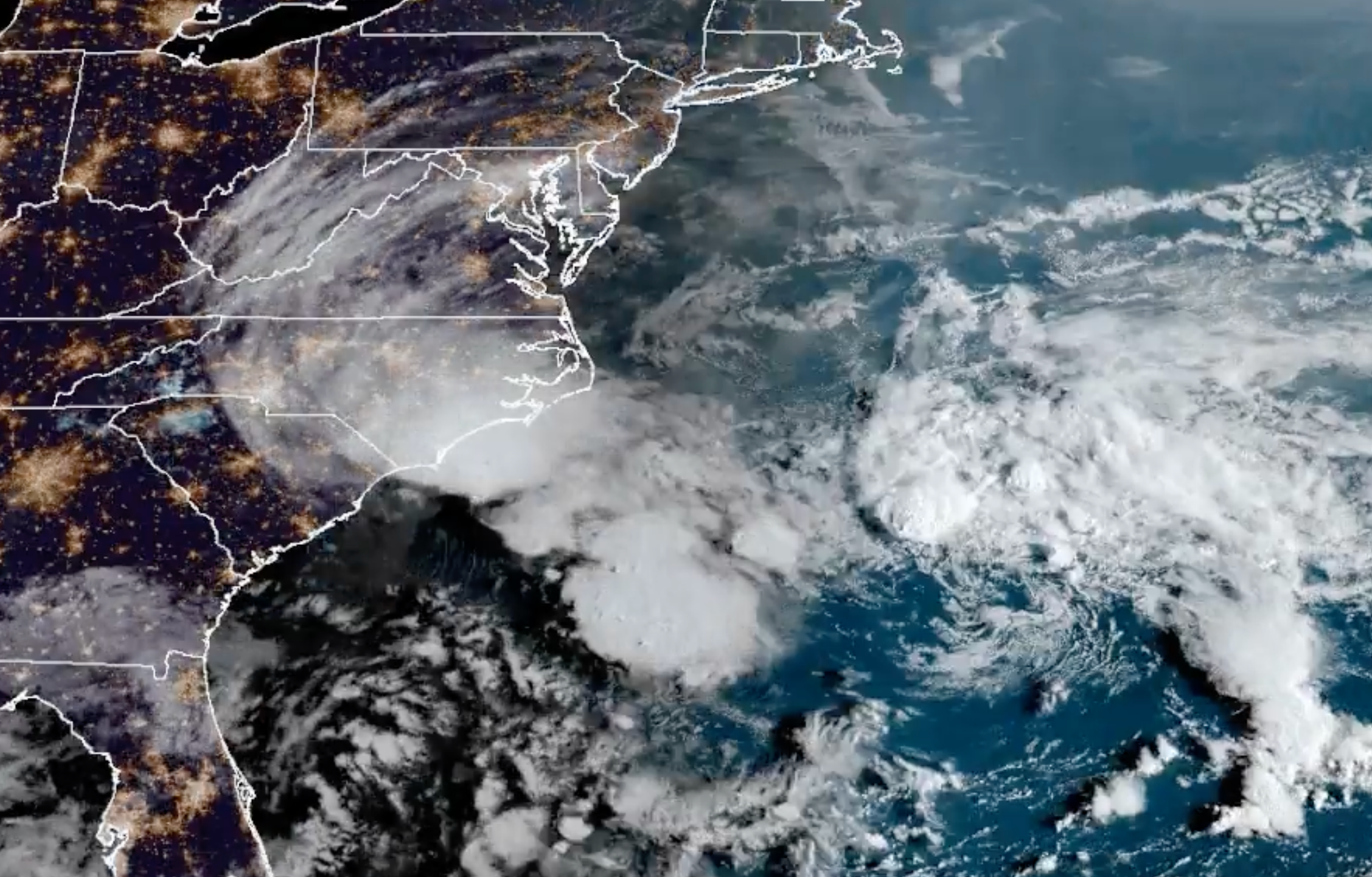 The NOAA GOESEast satellite shows an aerial view of the storm, known as Potential Tropical Cyclone Eight, earlier this morning. A tropical storm warning is in effect for parts of coastal North and South Carolina