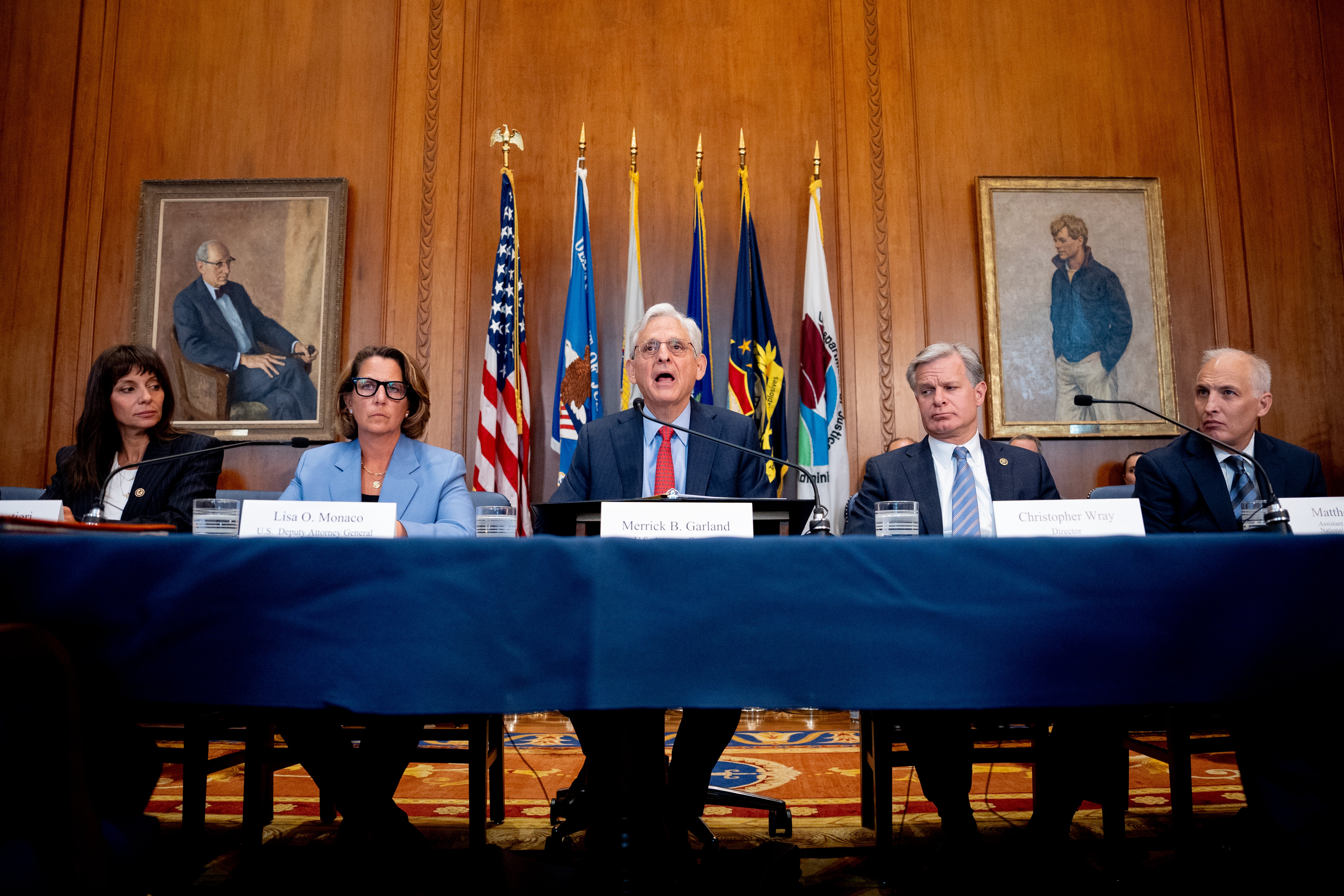 US attorney general Merrick Garland (C) accompanied from left, principal deputy assistant attorney general Nicole Argentieri, head of the Justice Department’s Criminal Division, deputy attorney general Lisa Monaco, FBI director Christopher Wray, and US assistant attorney general for the National Security Division Matt Olsen, speaks during an Election Threats Task Force meeting at the Justice Department on 4 September 2024