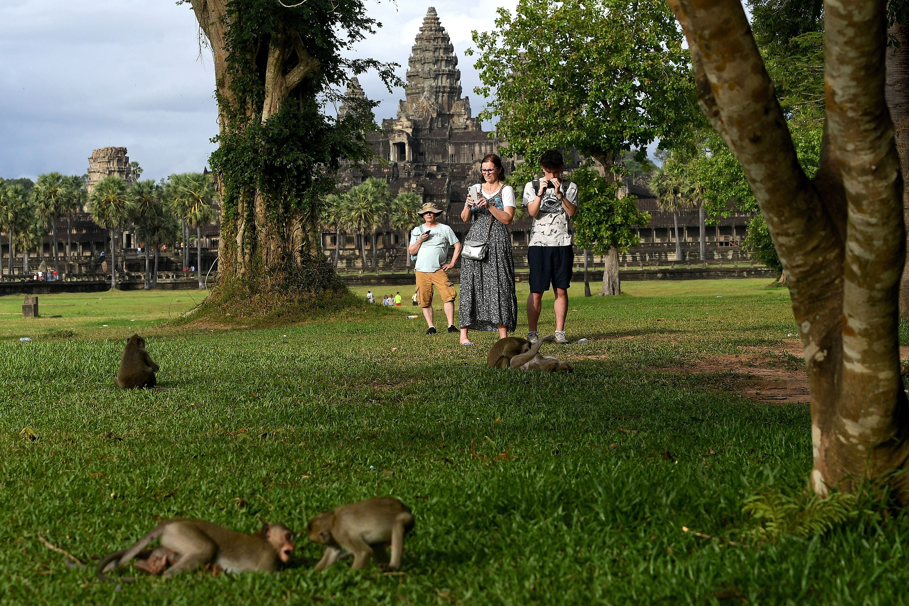 Tourists flock to the Angkor Wat temple complex, a Unesco World Heritage Site in Siem Reap