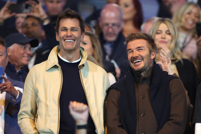 <p>Tom Brady and David Beckham watch on as Birmingham play Wrexham</p>