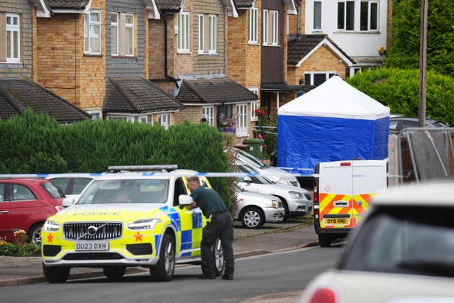 Police at the scene in Ashlyn Close, Bushey, Hertfordshire (PA)