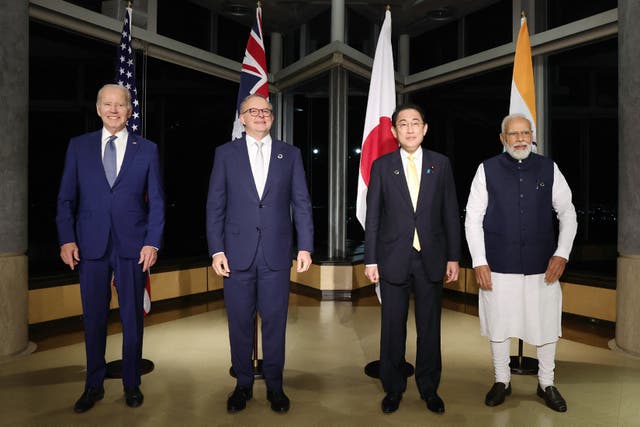 <p>Quad leaders Joe Biden, Anthony Albanese, Fumio Kishida and Narendra Modi pose for pictures as they meet on the sidelines of the G7 summit in 2023 </p>