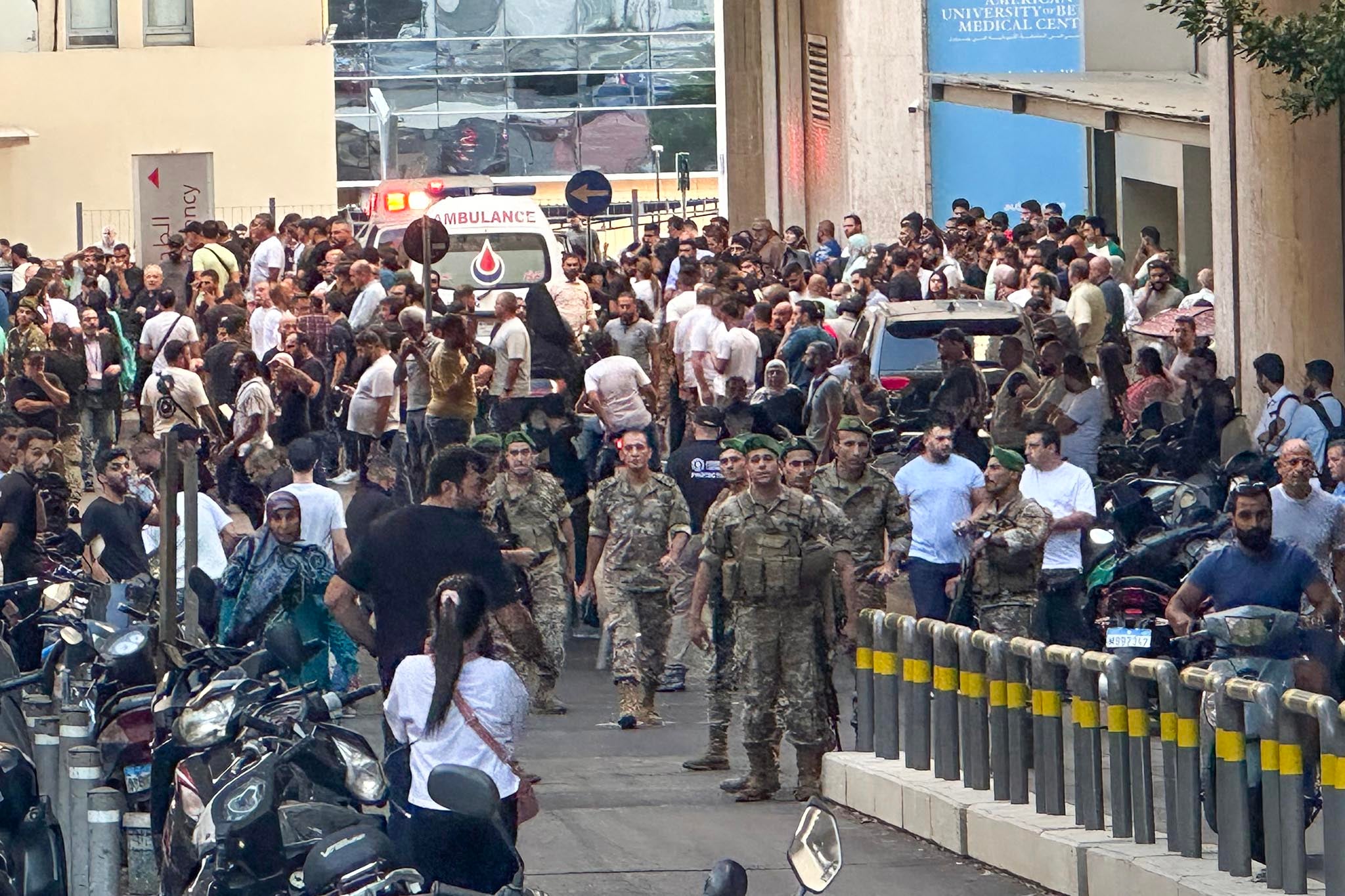 Lebanese soldiers gather outside a hospital