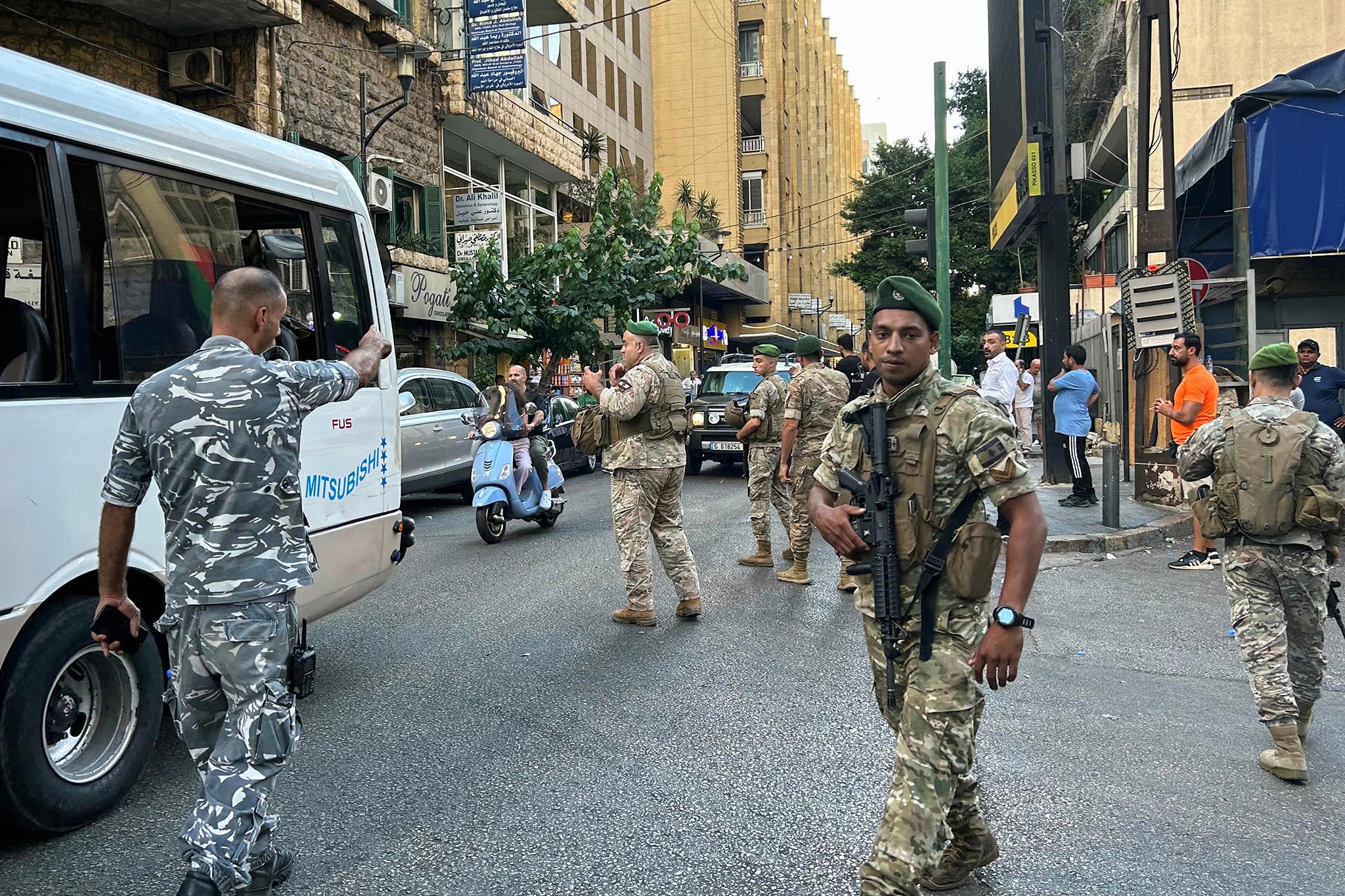 Lebanese army soldiers stand guard in Beirut after explosions were reported across the country