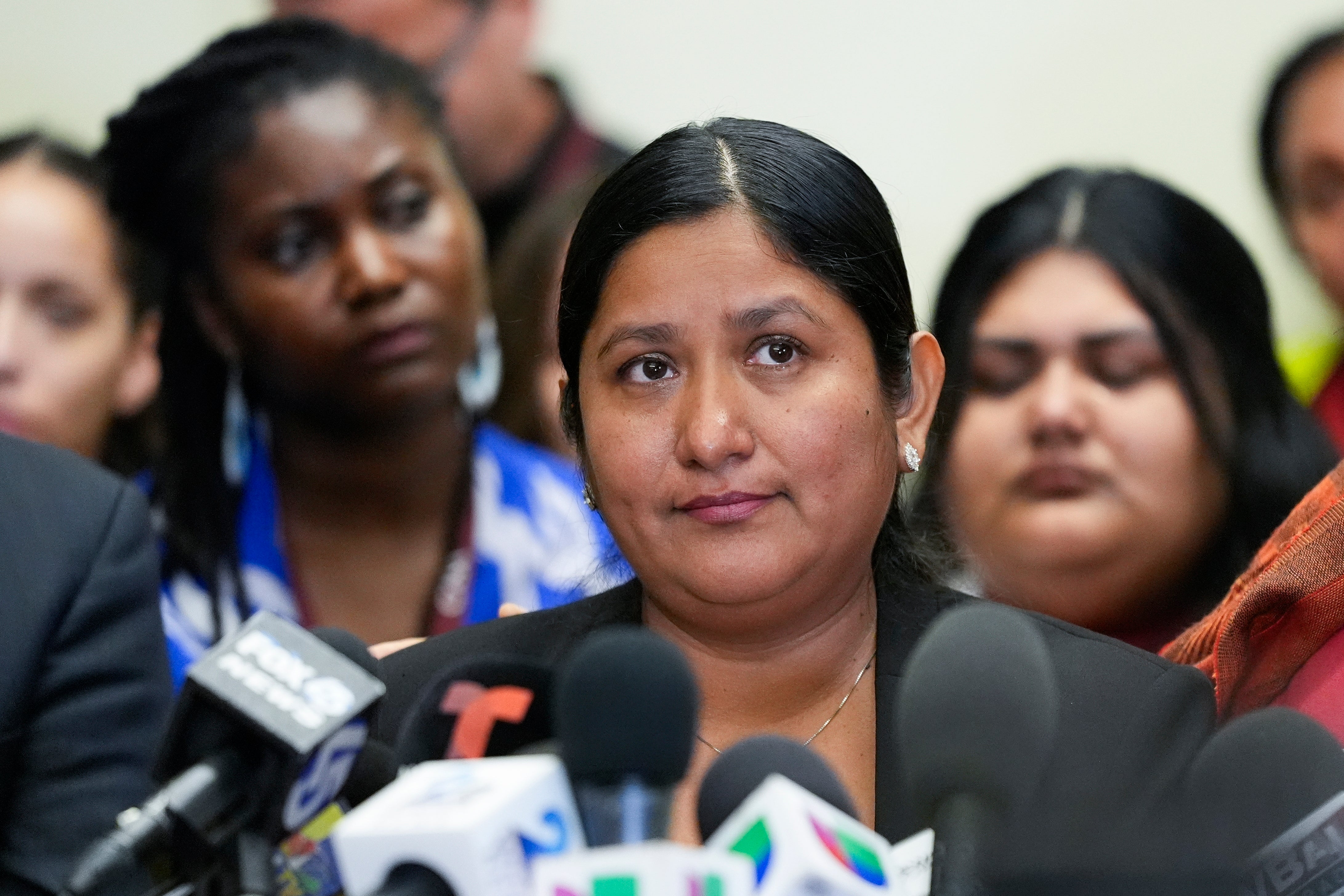 Maria del Carmen Castellón, the wife of Miguel Luna, a welder who died during the collapse of Baltimore's Francis Scott Key Bridge, speaks during a press conference on Tuesday