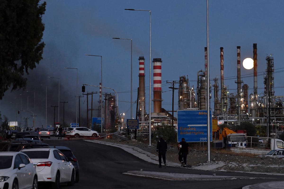 Greek firefighters contain a blaze at a major oil refinery that injured 3 workers