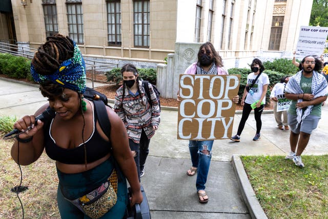 <p>Opponents of an under-construction law enforcement training center that critics call "Cop City," protest at City Hall in Atlanta, Monday, Sept. 16, 2024</p>