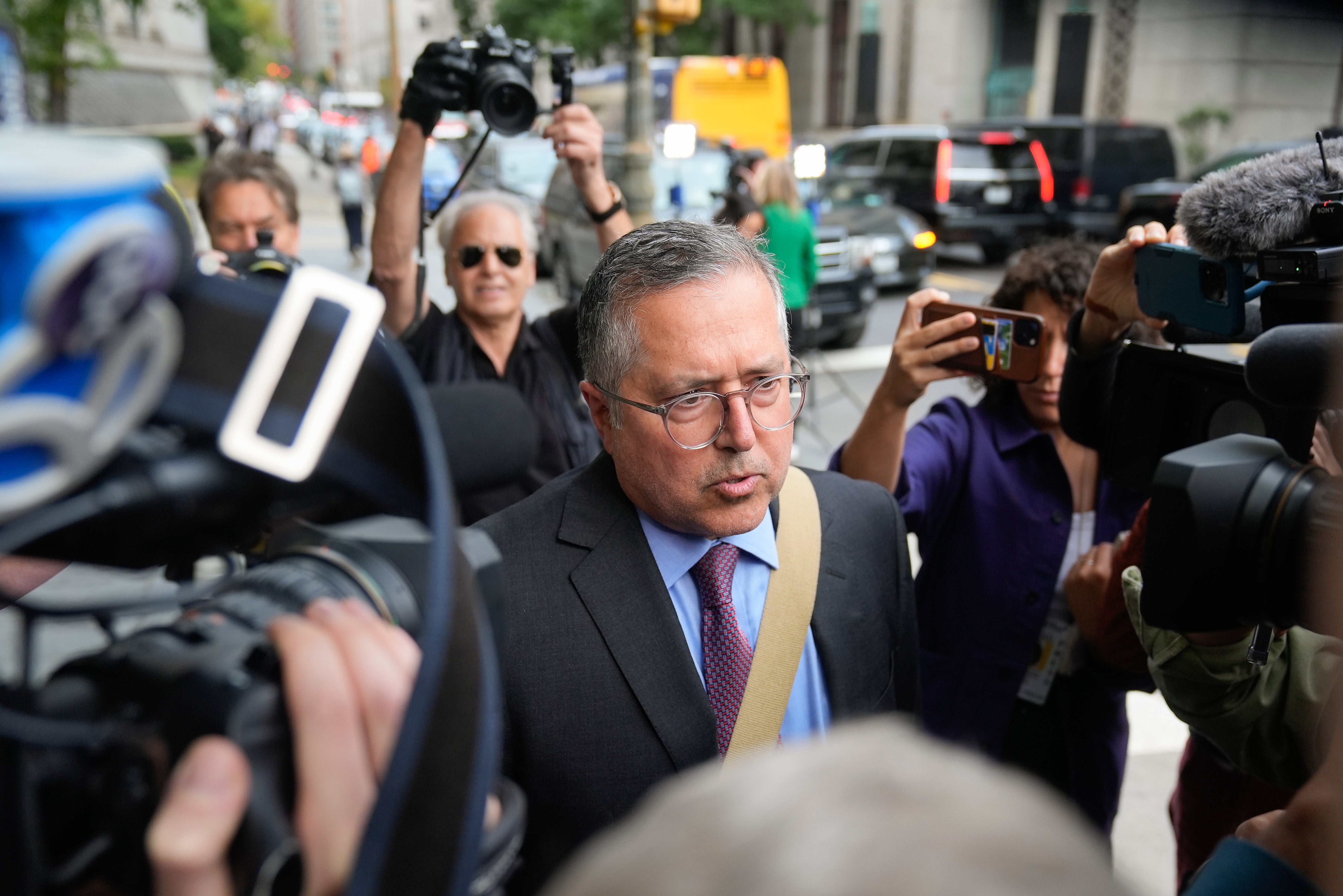 Diddy’s lawyer Marc Agnifilo speaks to the press outside of court