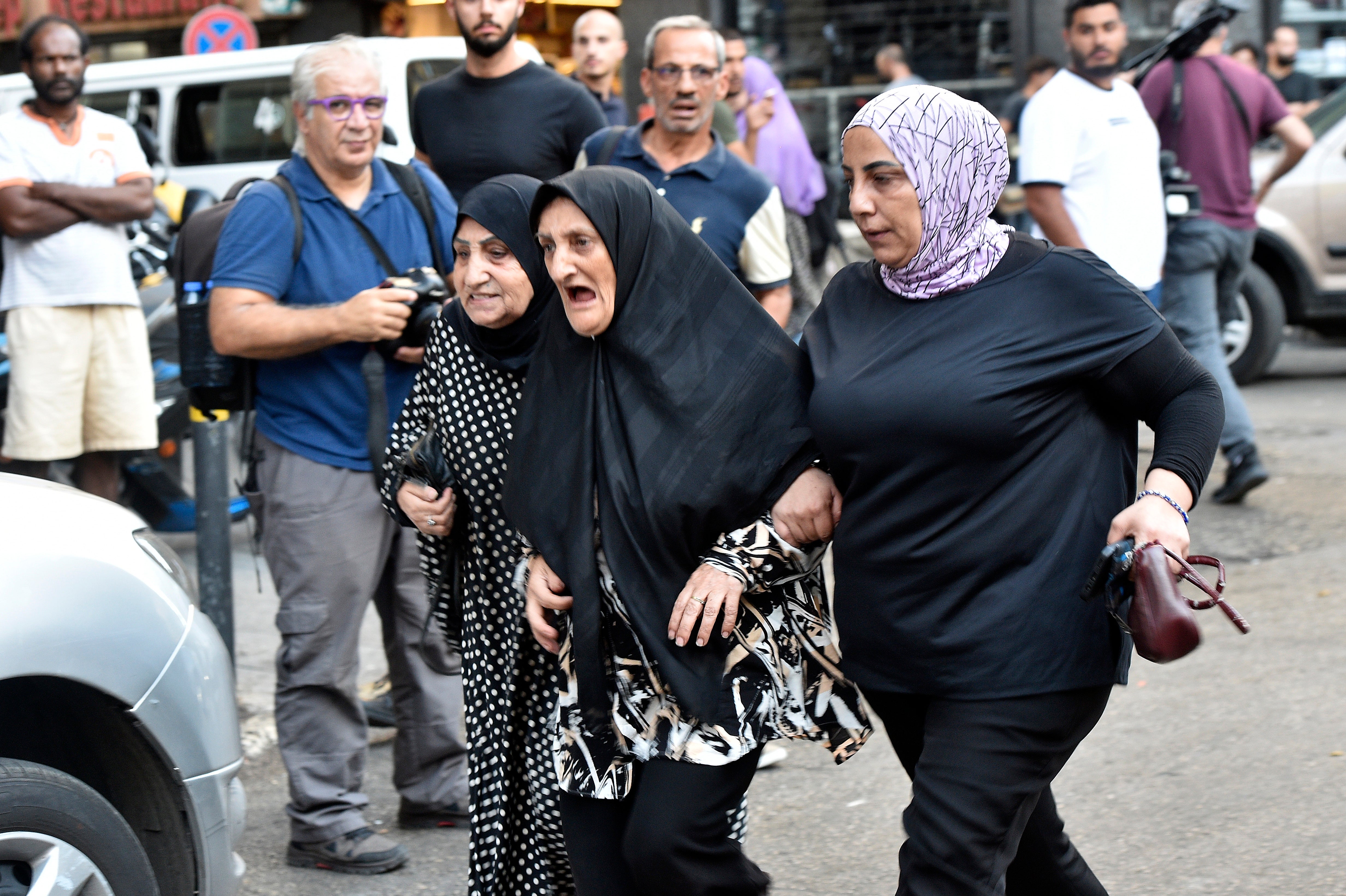 Friends and relatives of injured people arrive at the American University of Beirut Medical Center after an incident involving Hezbollah members’ wireless devices in Beirut, Lebanon, 17 September 2024