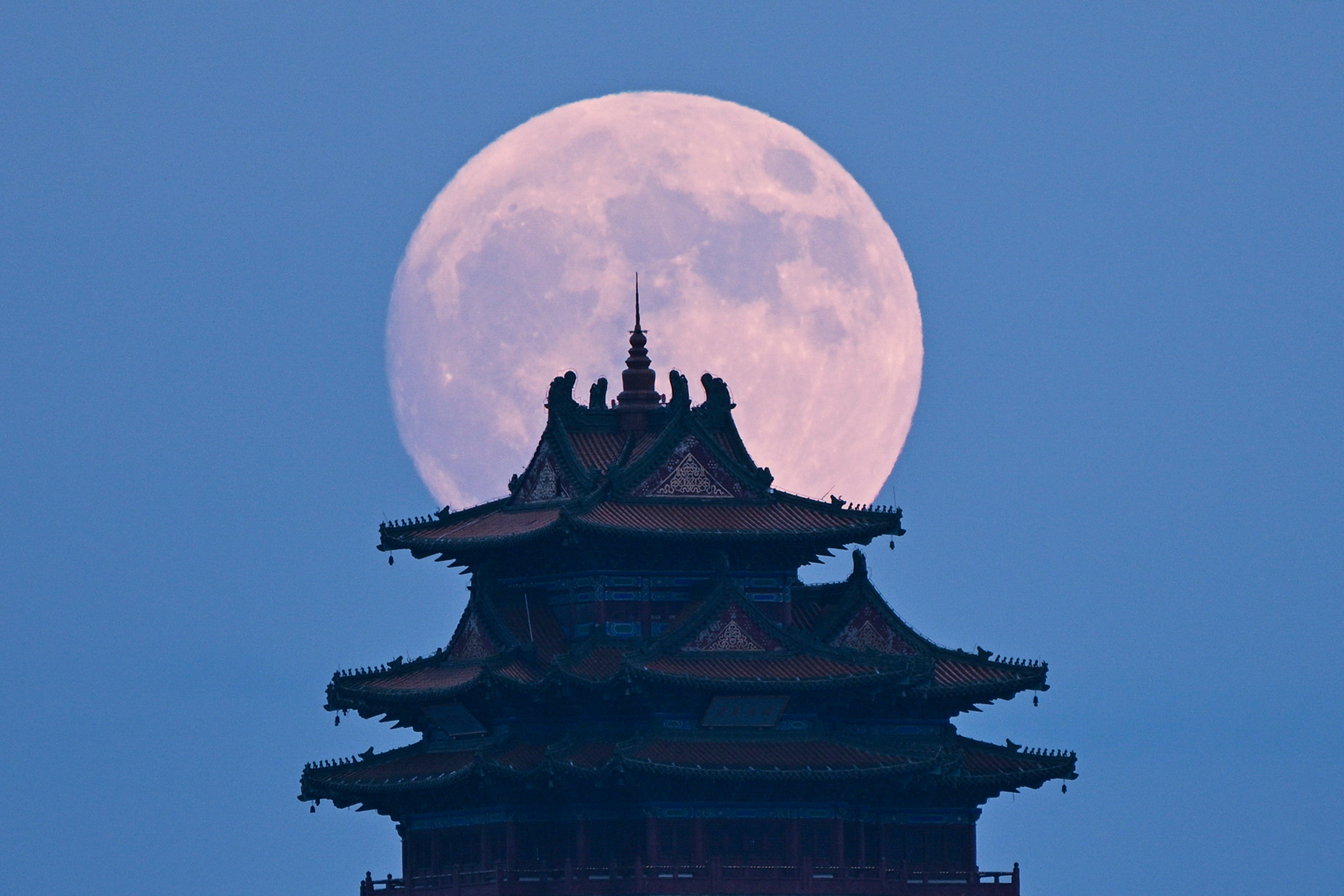 A Supermoon rises over a pagoda during the Mid Autumn Festival in Nanjing, in east China
