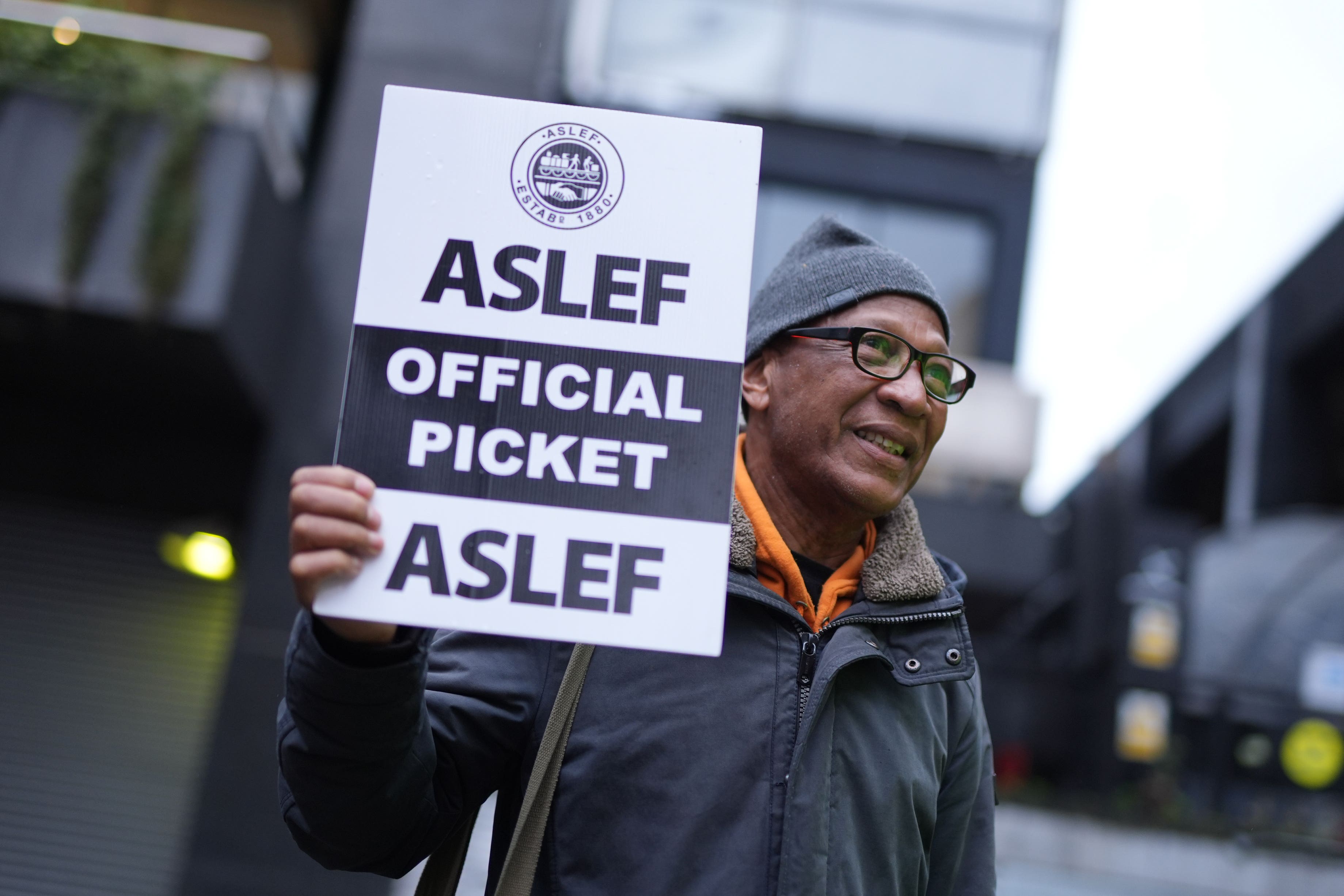 Train drivers from the Aslef union on the picket line at Euston station in London in April