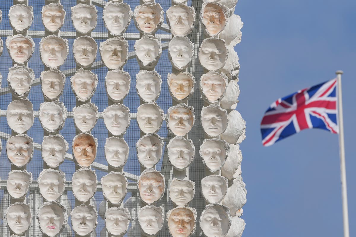 Faces of transgender people adorn an artwork in London's Trafalgar Square