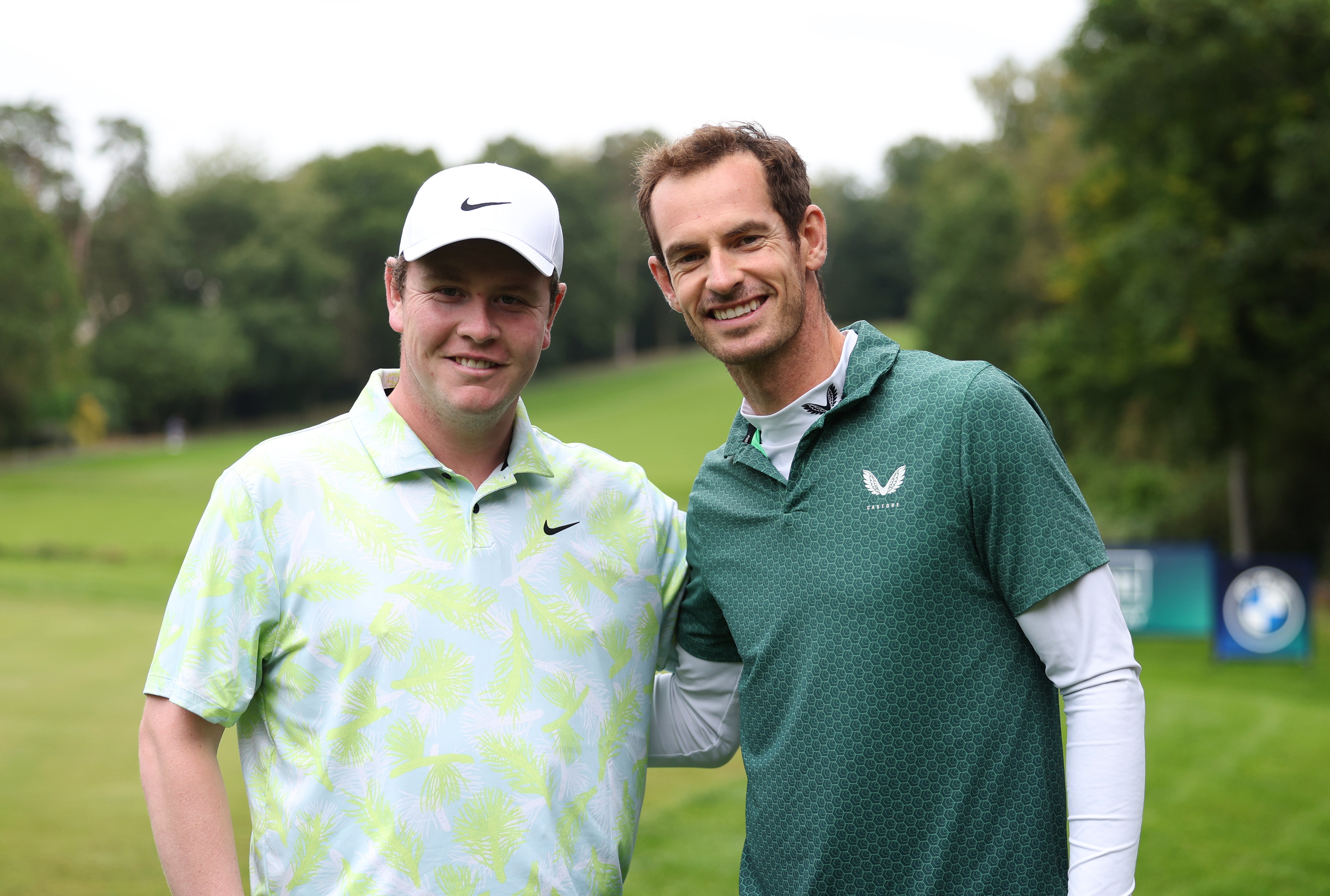 Robert MacIntyre of Scotland and Andy Murray pose for a photo