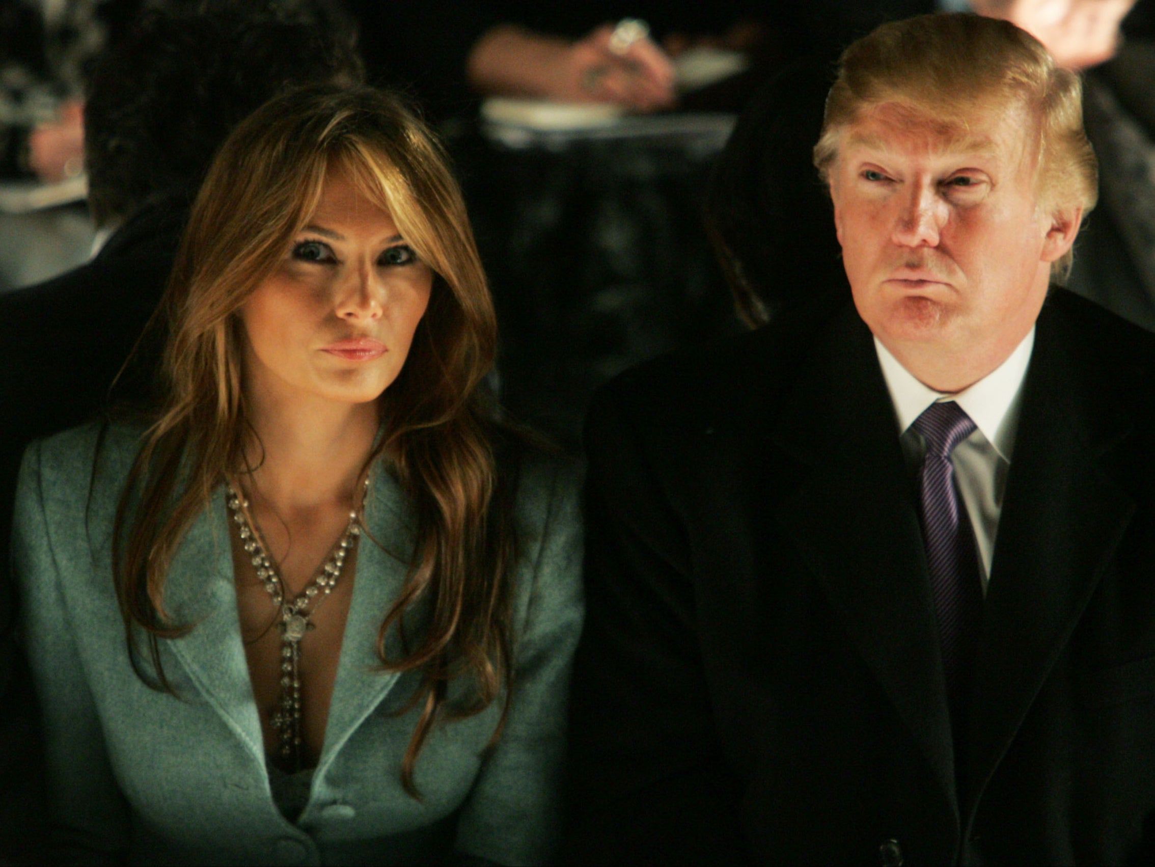 Melania and Donald Trump attend the Michael Kors fall fashion show in New York City on February 9, 2005