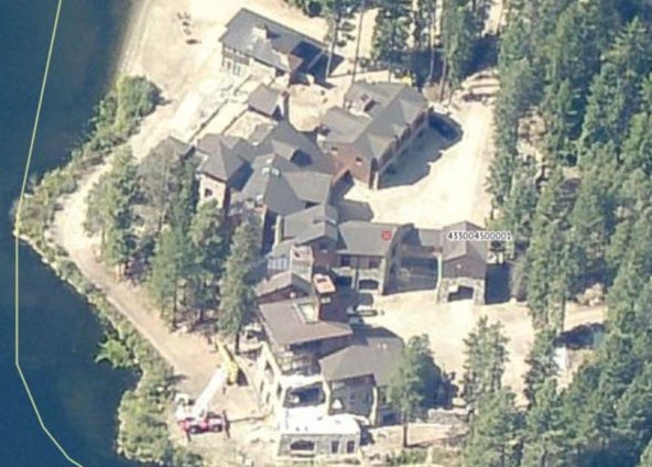 Authorities said there is currently no evidence to suggest his death at the lake house (pictured from above) was suspicious