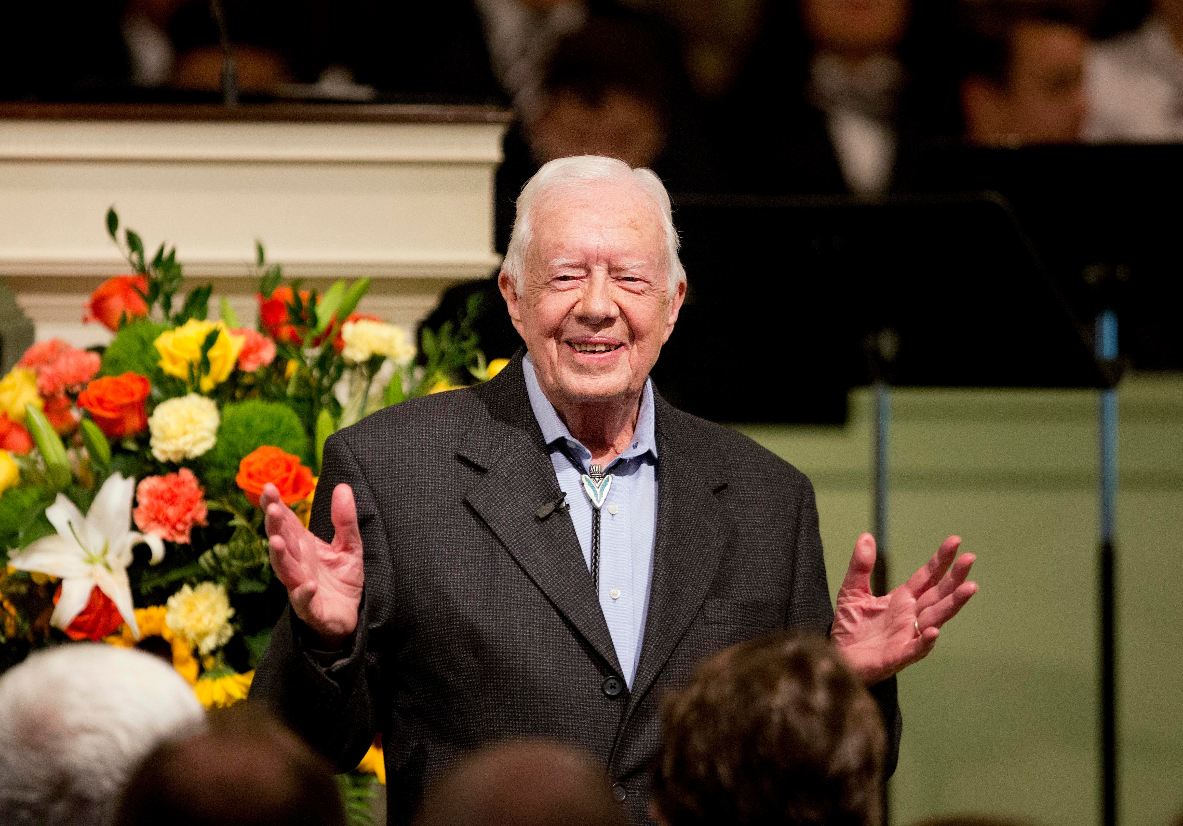 Former President Jimmy Carter teaches Sunday School class at the Maranatha Baptist Church in his hometown of Plains, Georgia, in 2015. He turns 100 on Tuesday, and his grandson warned that he is ‘very limited’ in his day-to-day activities