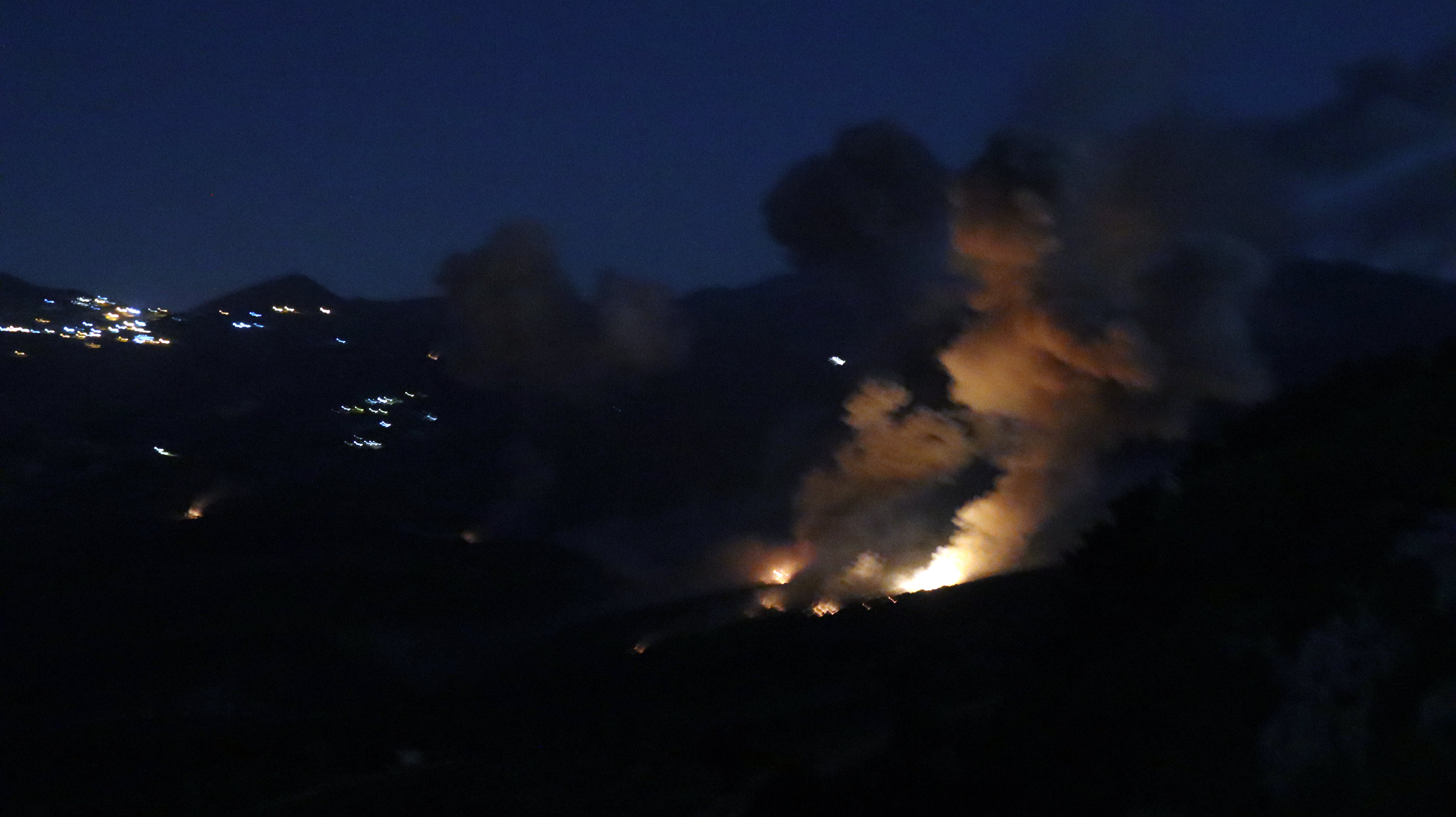 Smoke and flames rise after Israeli army launched attacks on Al Mahmudiyah, located in southern Lebanon